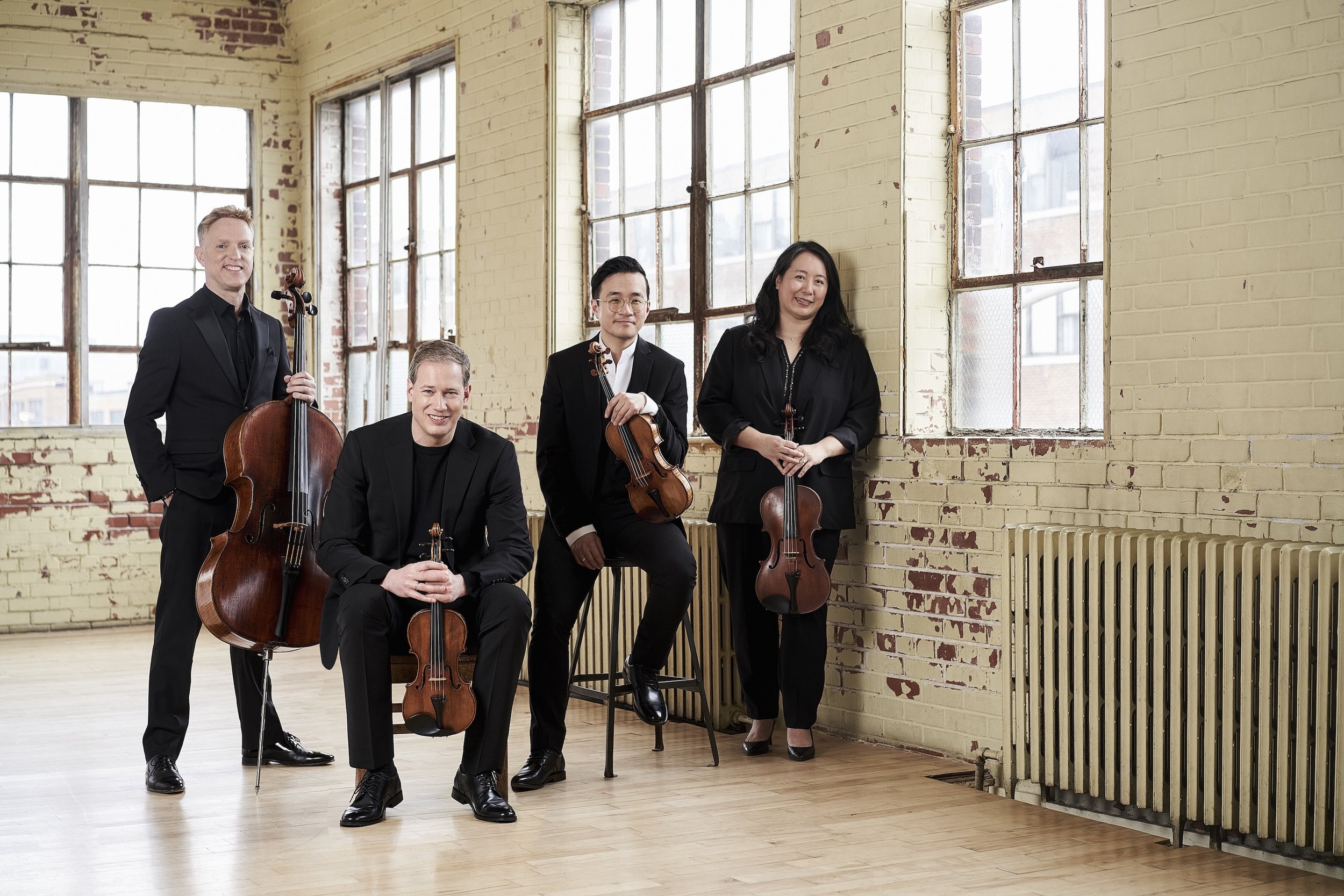 New Orford String Quartet Headshot with instruments