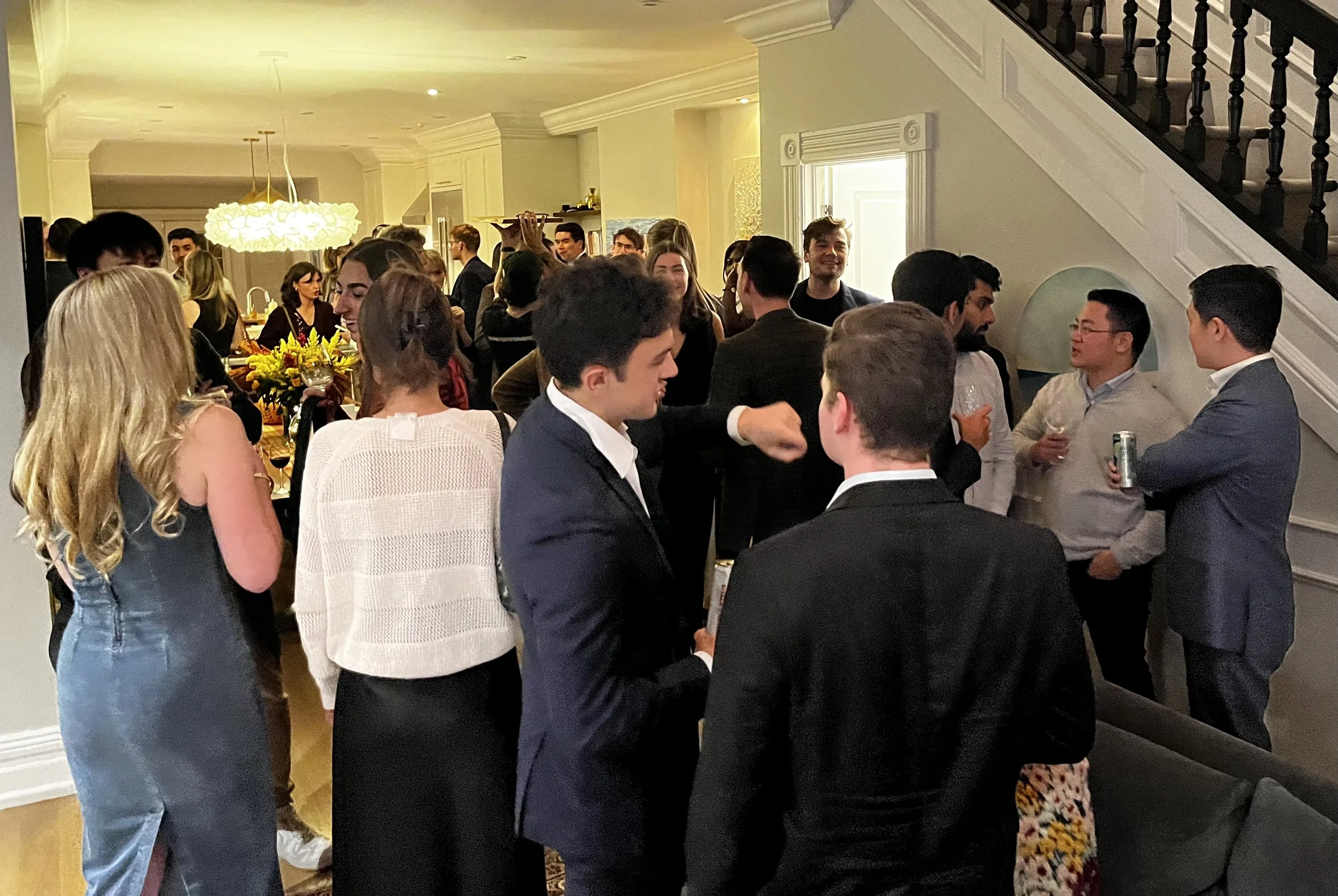 Young professionals attending a Music Toronto chamber music event and networking experience.