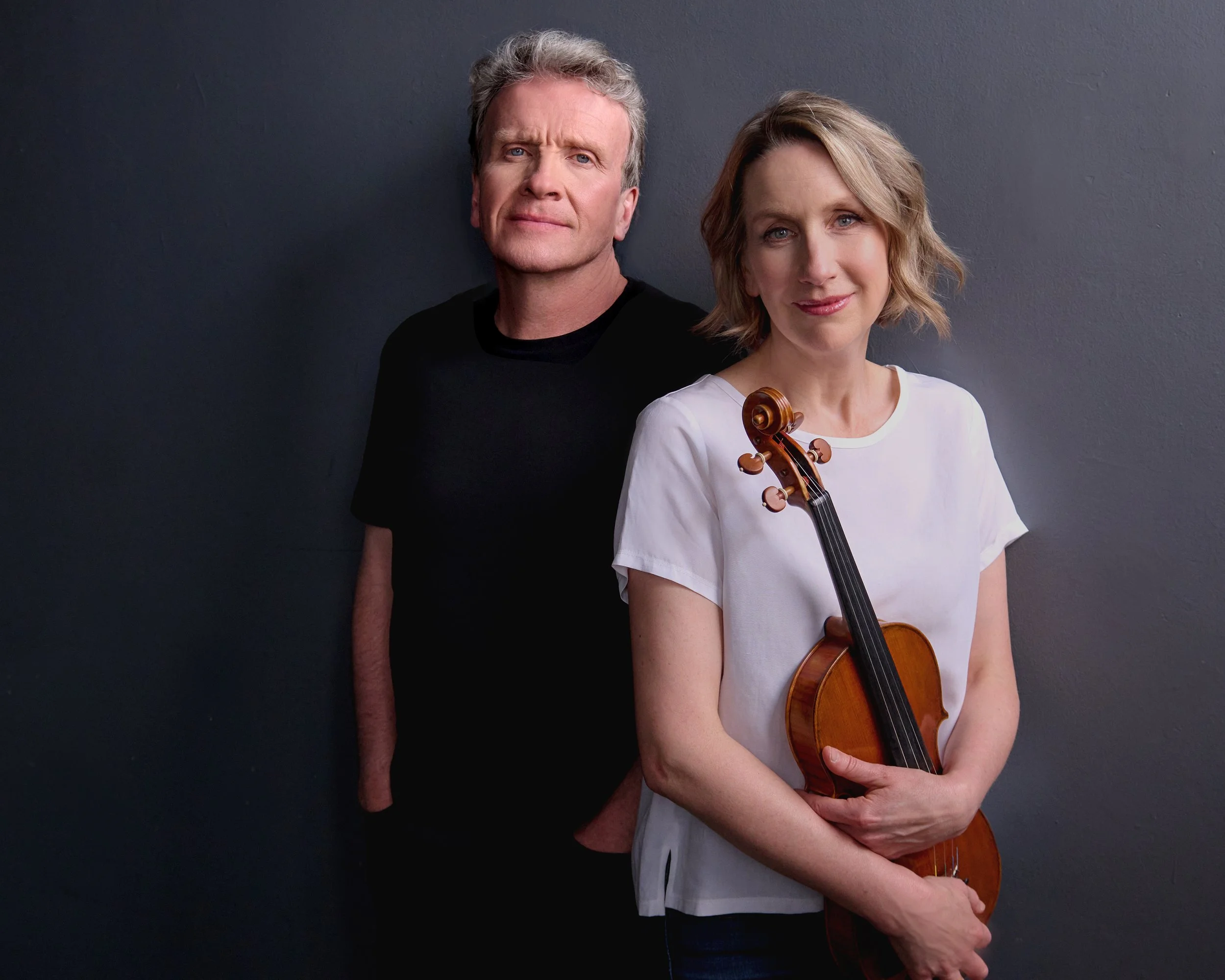 Duo Concertante headshot with instruments