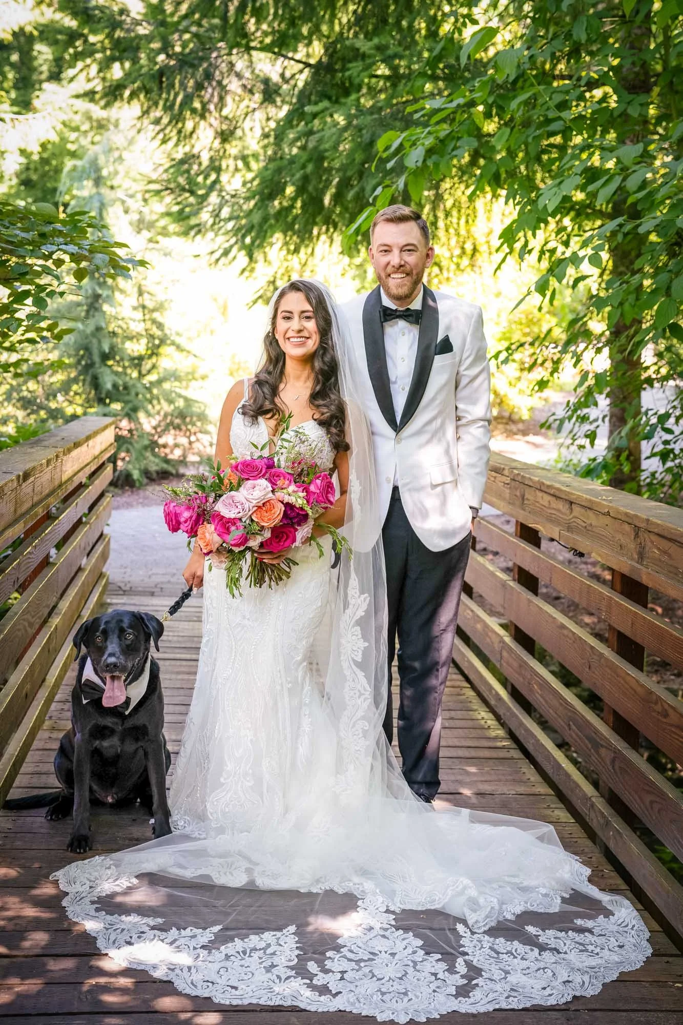 Bride and groom with dog at Abernethy Center wedding.