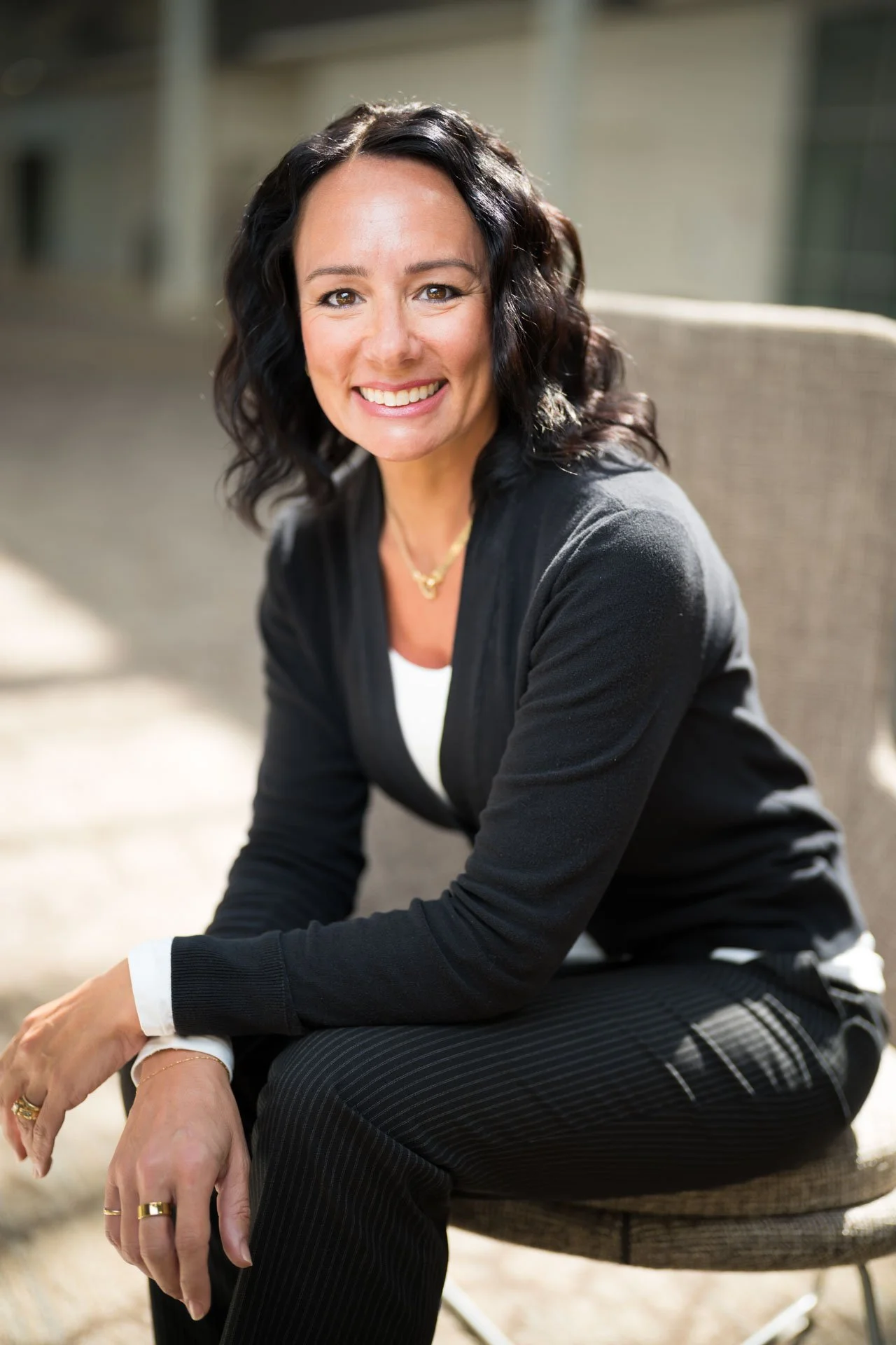 Professional executive portrait of womanman in black outfit in Portland.