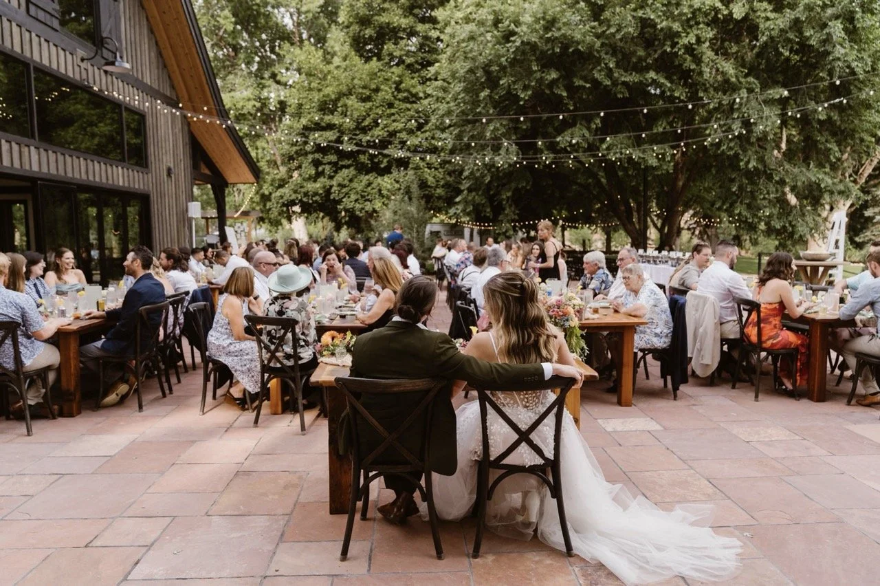 reception-toasts-outdoors-Koley-and-Julie-Alpine-Vows-Photography .jpeg
