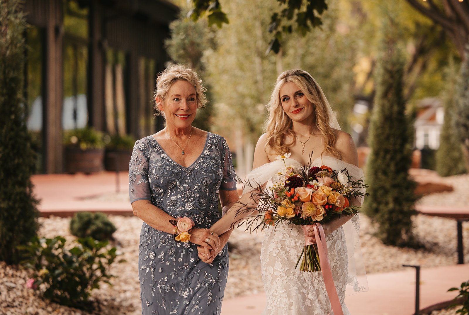 sarah+dylan-EmilyElizabethPhoto-Oct2025-bride-mother-aisle.jpg