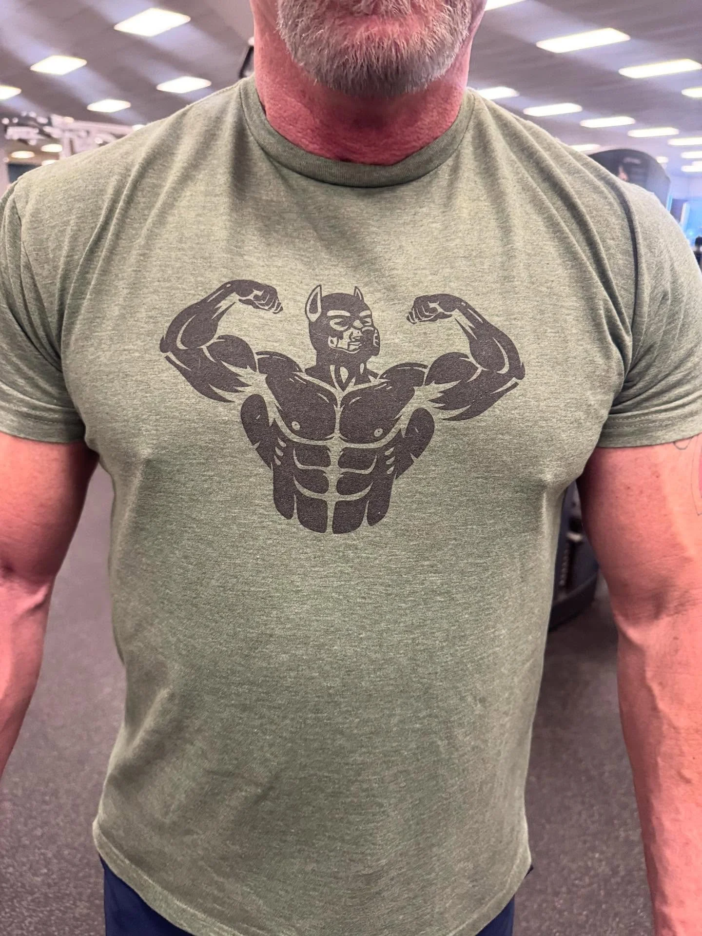 Sexy Daddy friend rocking the FLEXgear logo shirt.  Even if he looks better with it off ;)