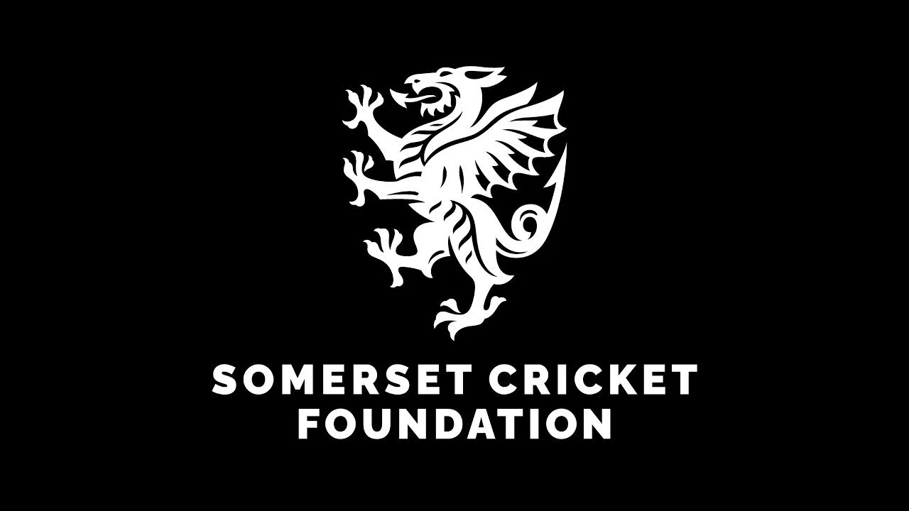 Black background with a white heraldic dragon and the text 'SOMERSET CRICKET FOUNDATION' underneath.
