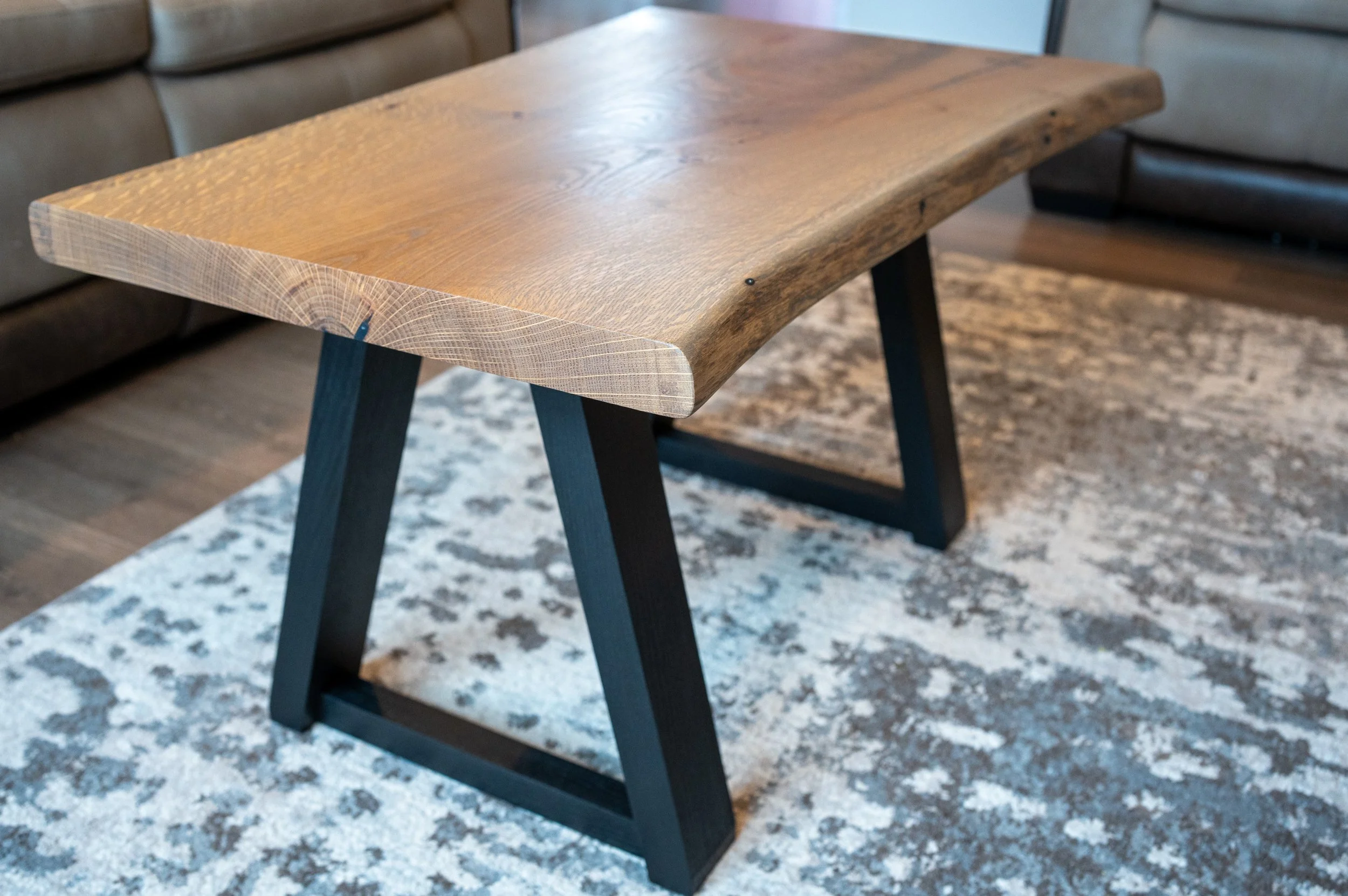 White Oak Hardwood Coffee Table, Featuring Stained Black Legs, And A Bowtie Inlay To Stabilize A Check