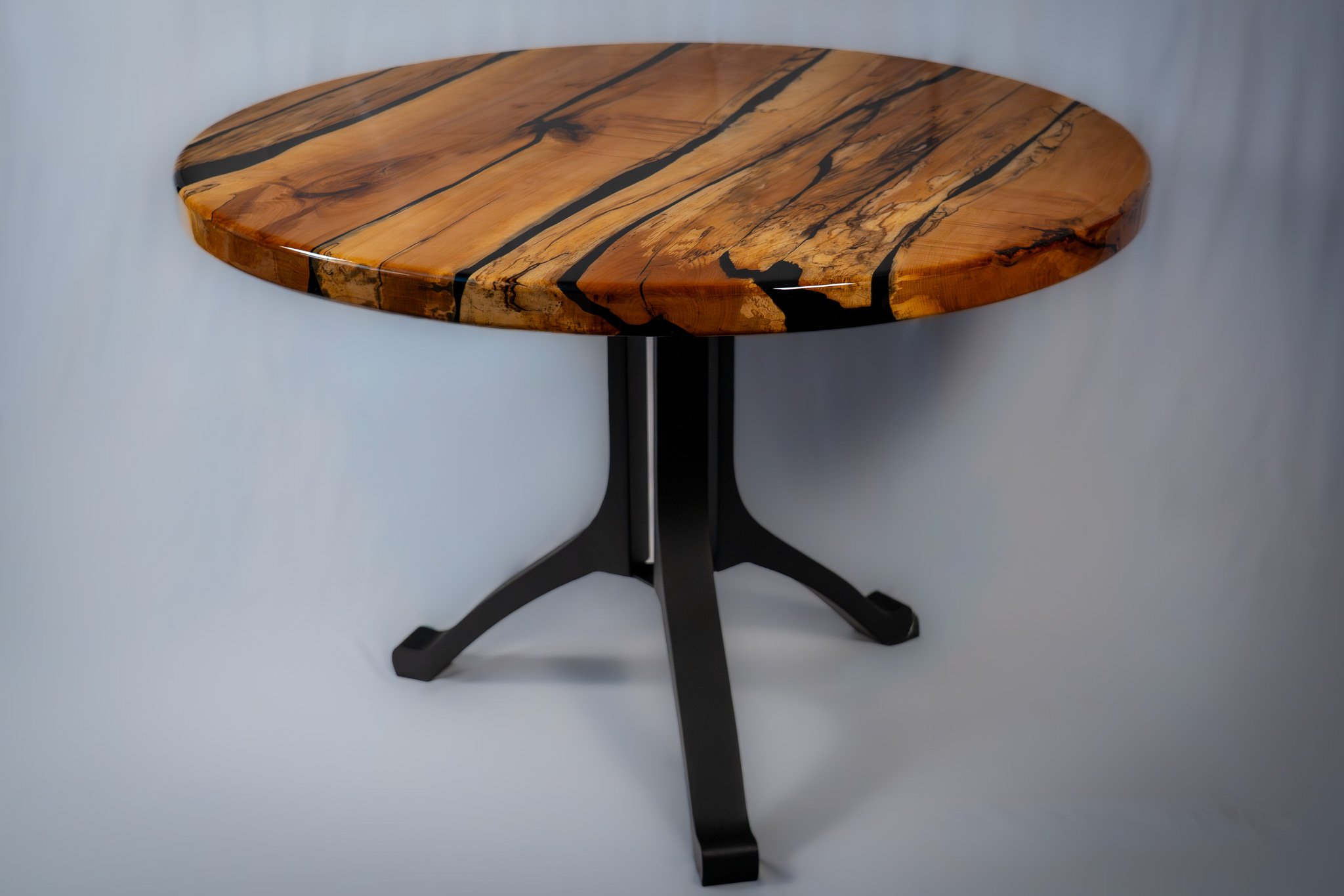Spalted Maple Hardwood Table Featuring Metal Legs and Epoxy Channels To Stabilize The Partially Decayed Wood.