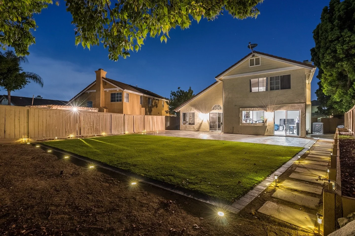 🌙 Experience the Magic of a Backyard Built for Every Occasion! 🌿✨

Tired of the same old backyard? Let us help you create an outdoor space that looks this stunning, day or night! From beautiful pavers to lush turf, our custom designs are perfect fo