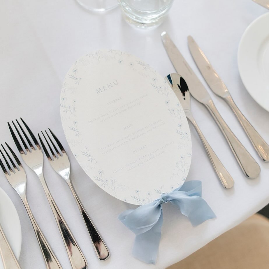 Oval menu with blue floral boarder and silk ribbon 🤍

Venue: @goldneyevents
Photographer: @csams.photo
Videographer: @bathweddings
Makeup: @aglaiahairandmakeup
Hair: @zoebrown_mua
Cake: @angels_kitchen
Catering Partner: @parsnip_mash
Bridal shop: @b