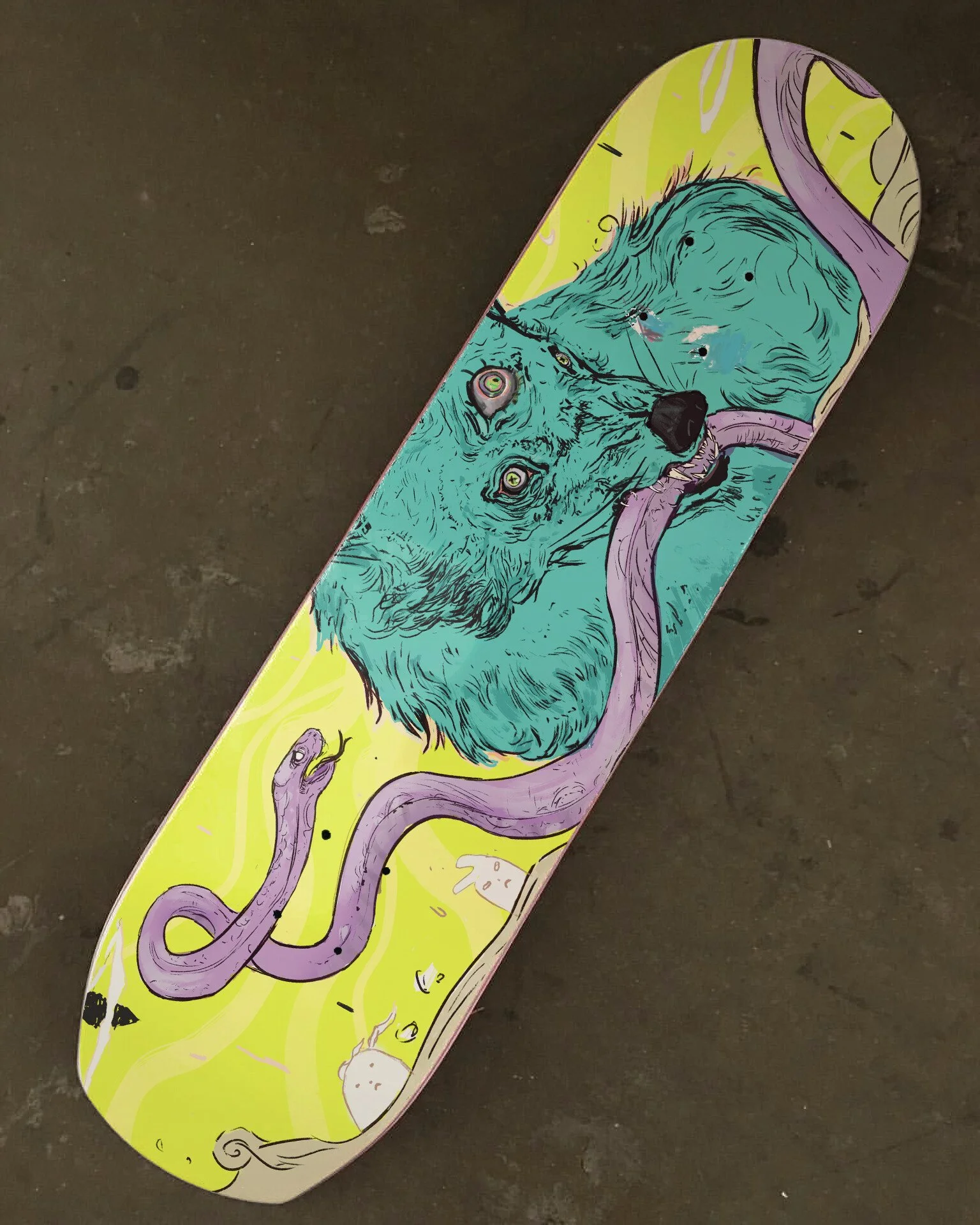 A skateboard deck featuring an illustration of a blue, furry dog with yellow eyes, surrounded by purple snakes on a bright yellow background.