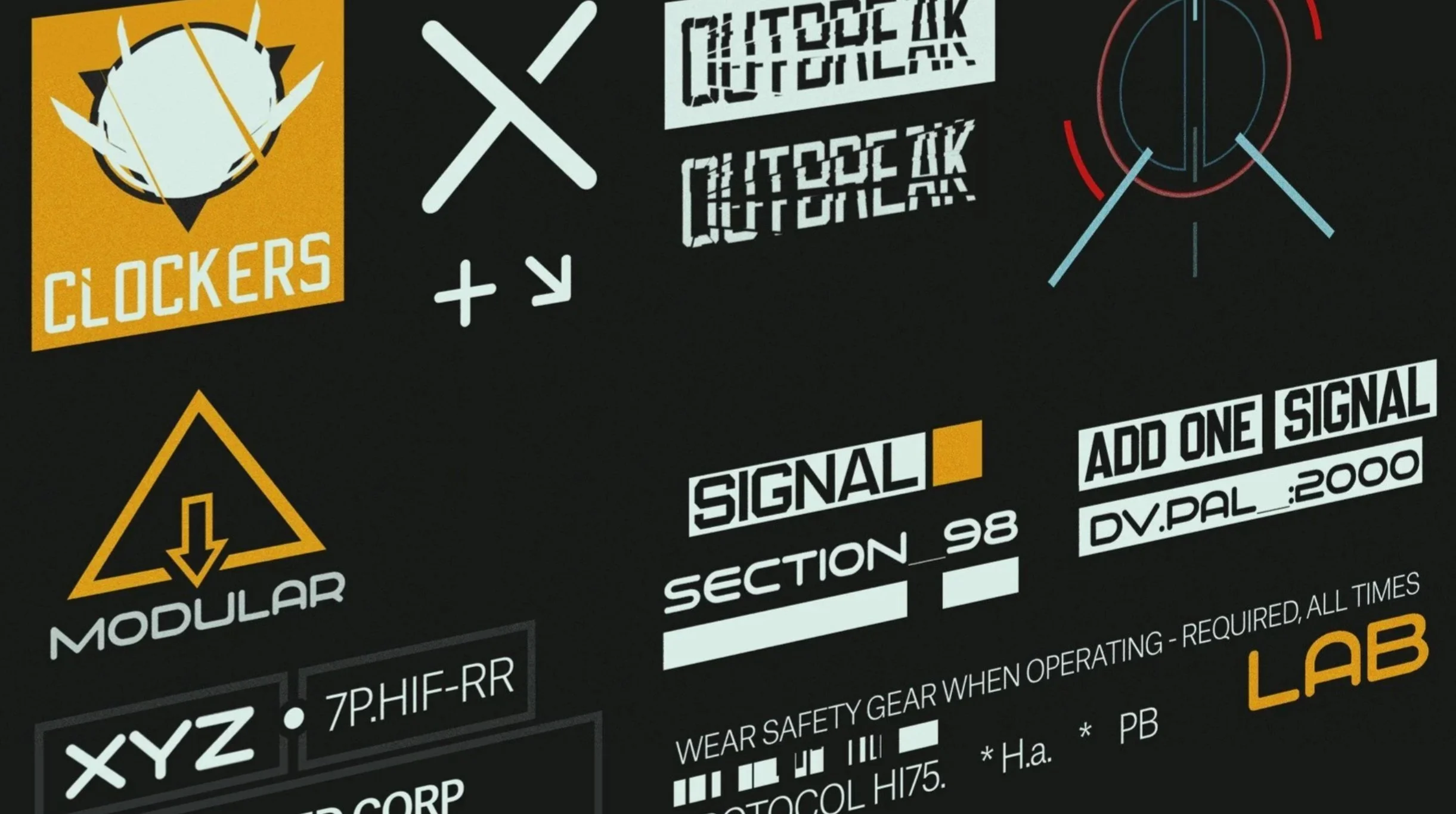 Close-up of a collection of technical, digital, and sci-fi style graphic elements including text, symbols, and icons on a black background. The elements include logos, warning signs, and labels related to digital systems or technological interfaces.