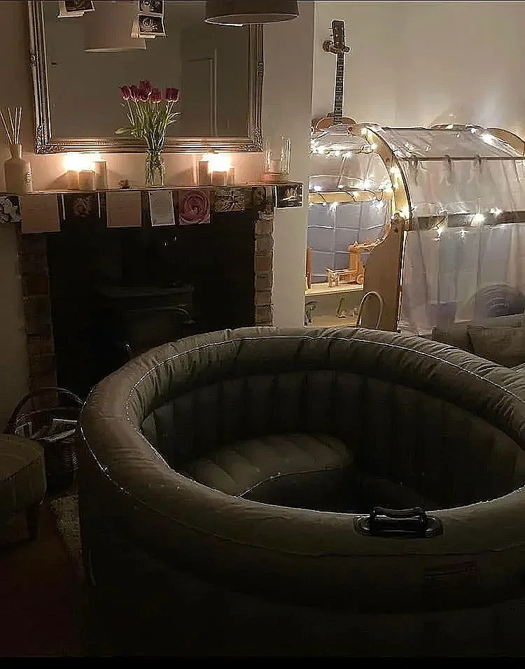 Inflatable birth pool set up in a home, ready for labour and birth.