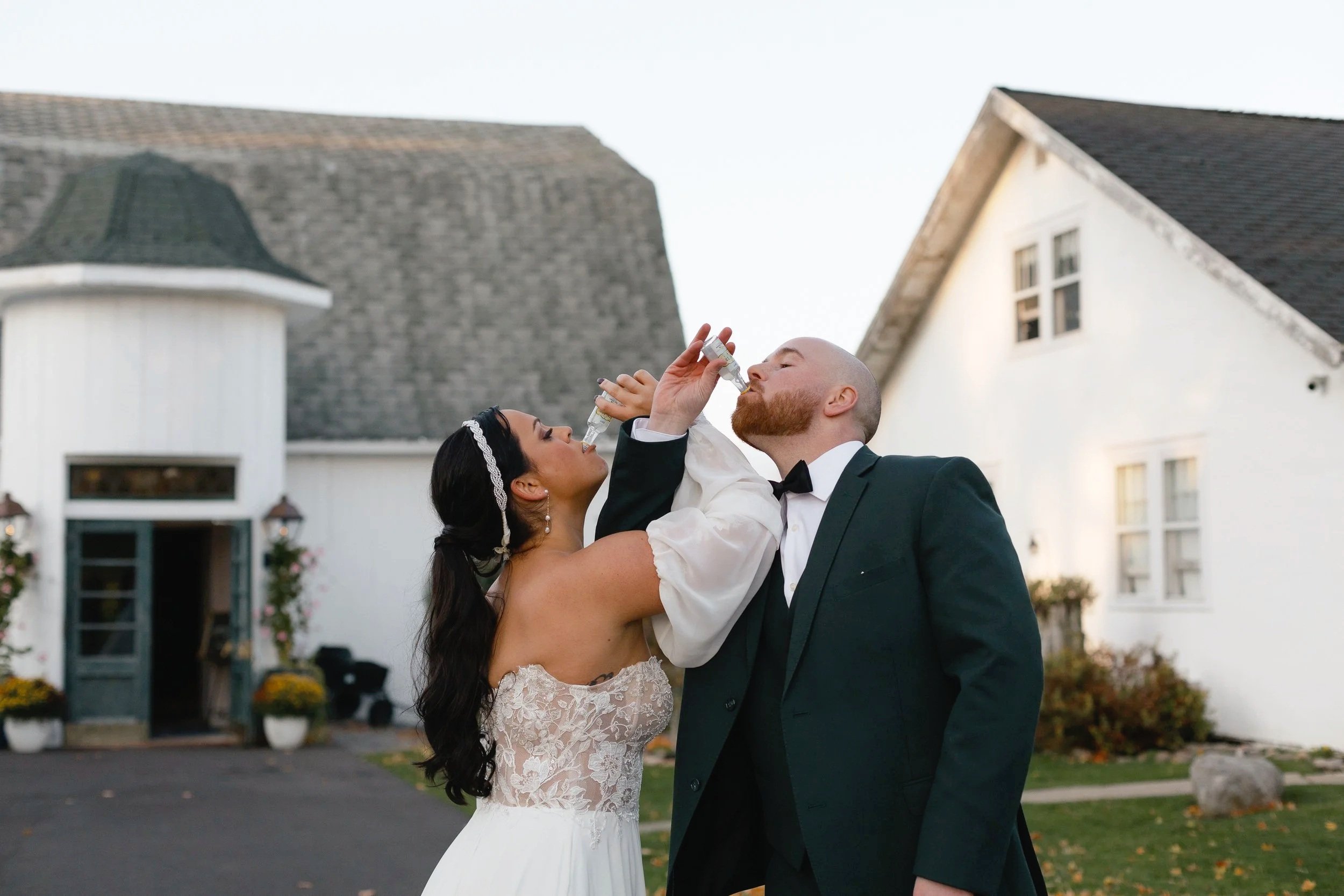 A bride and groom sharing a private, candid moment, at their wedding in East Aurora, New York