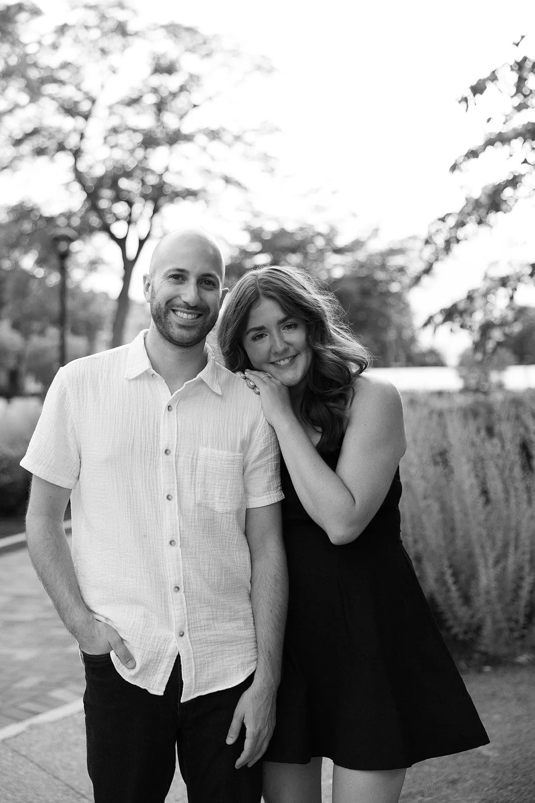 Black and white photo of couple during engagement session at Memorial Art Gallery in Rochester, New York