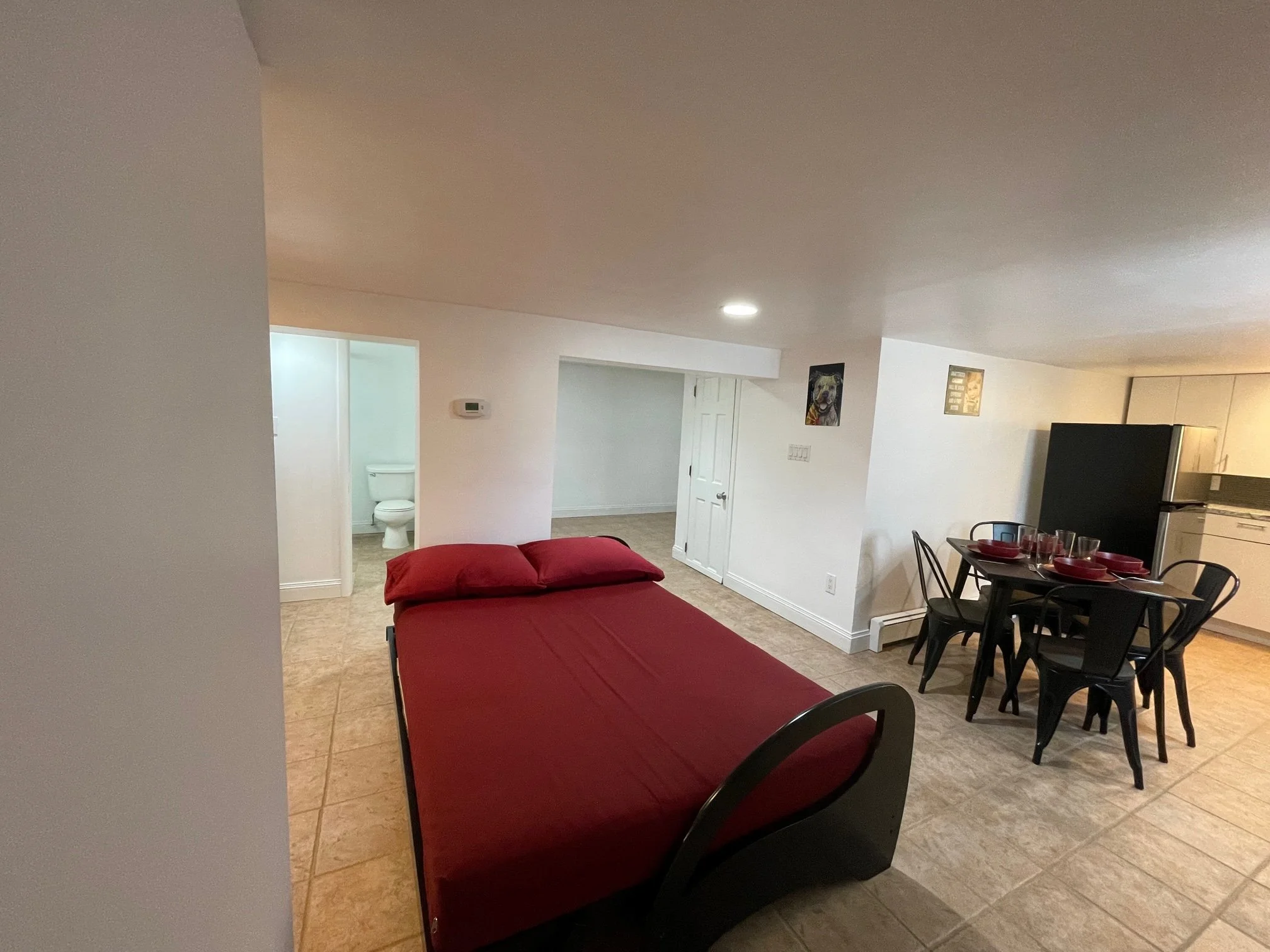 Futon, bathrm, kit table.JPG