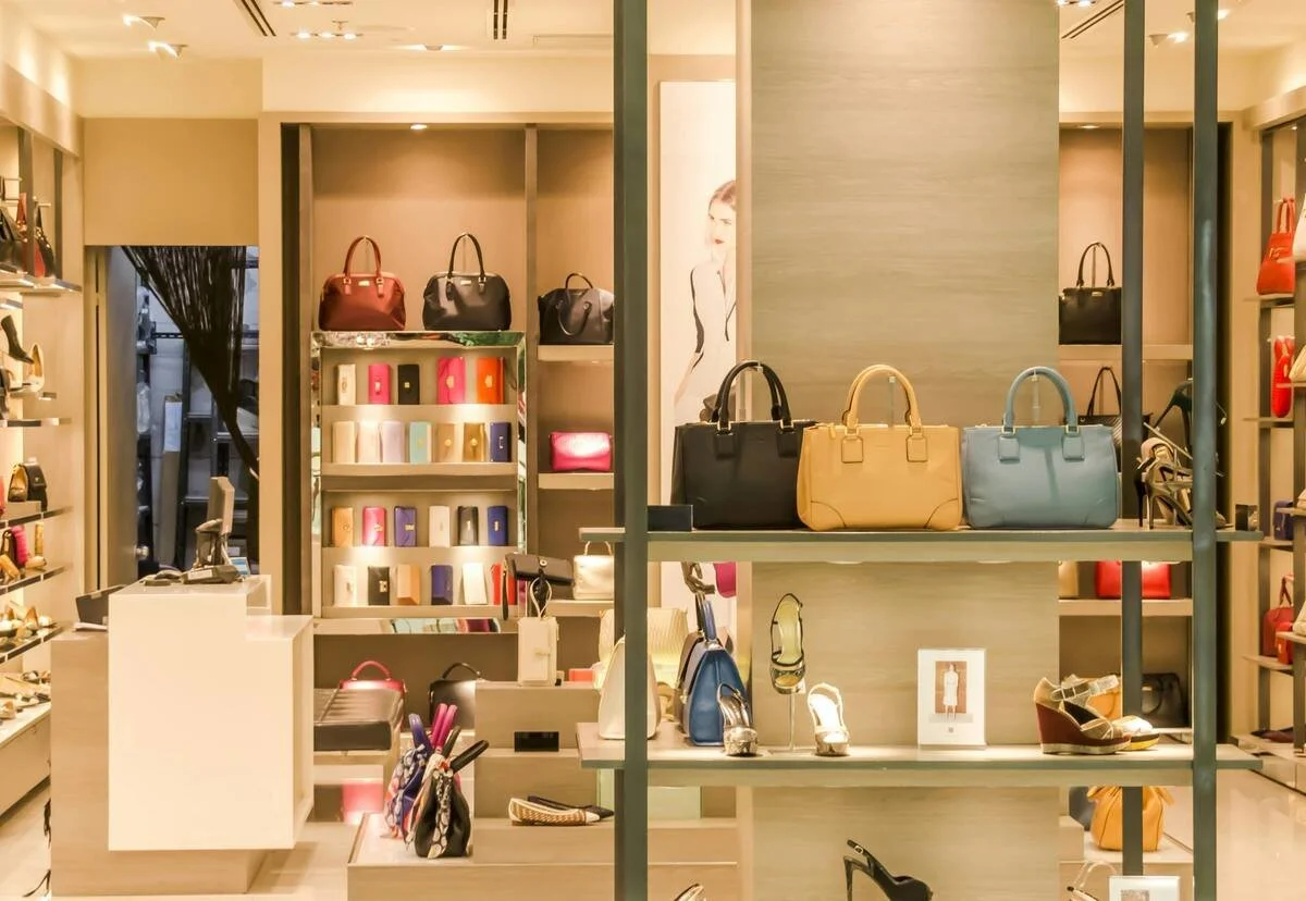 Luxury handbags and shoes on display — status spending and hedonic adaptation on the path to Financial Independence.