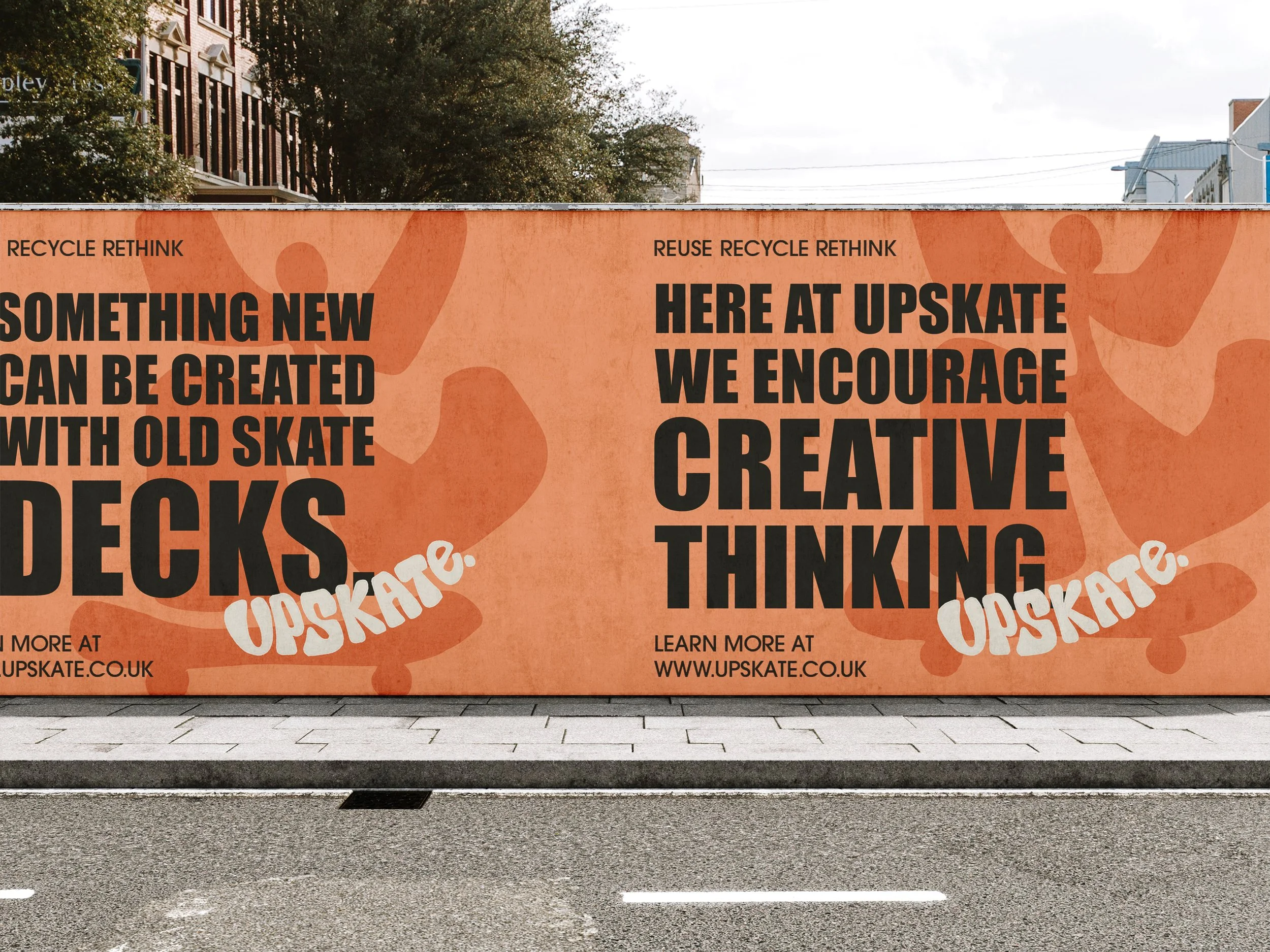 An orange billboard with black and white text promoting skateboarding and creative thinking, featuring the words 'Recycle, Rethink, Upskate' and the website www.upskate.co.uk.