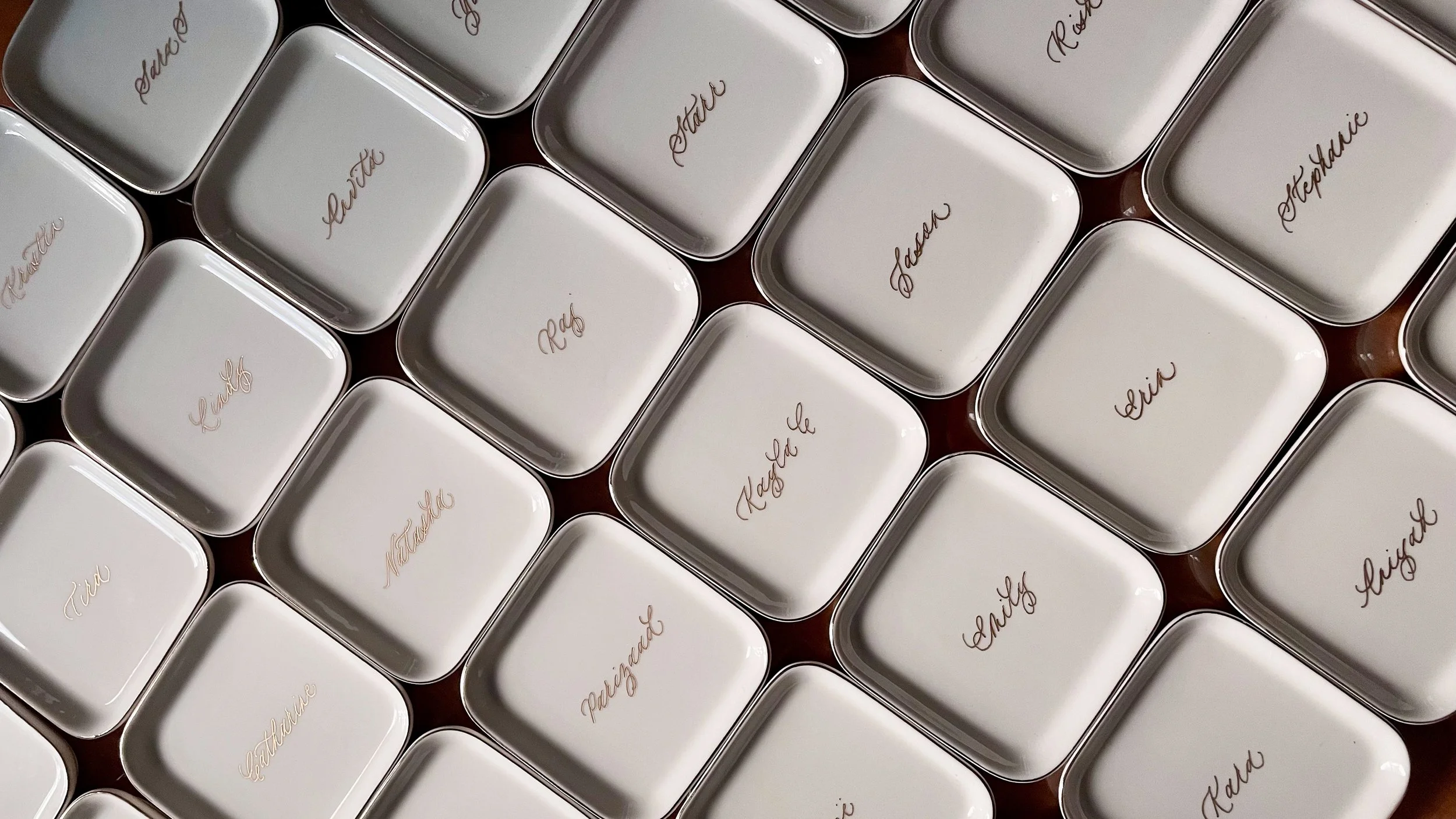 Engraved ceramic dishes with gold fill calligraphy