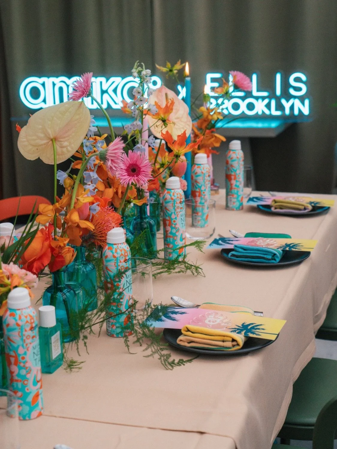 a little throwback from last year with @amika &amp; @ellisbrooklyn 🌞

obsessed with how bright and colorful this dinner was. we did paint pen on clear acryllic leaves, keeping the place cards simple amidst the abundance of florals that instantly tra