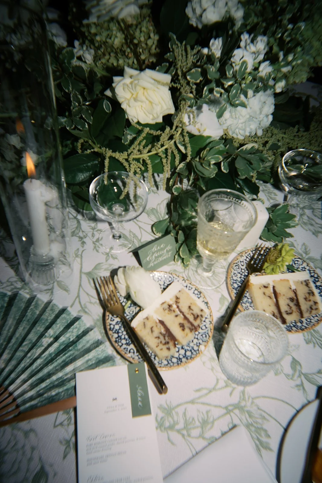 Green and white wedding reception table details