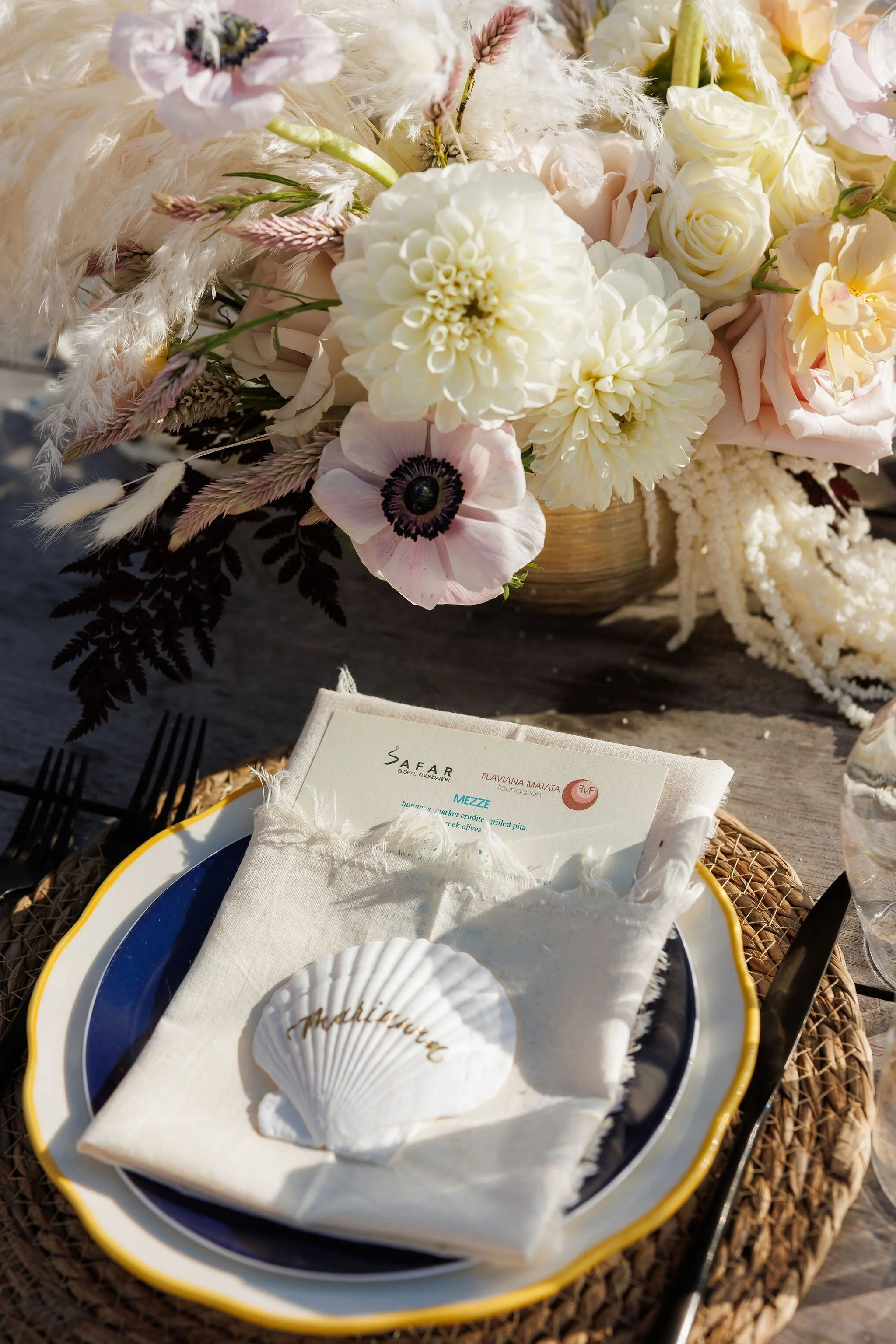 safar-global-hamptons-dinner-seashell-calligraphy-place-cards.jpg