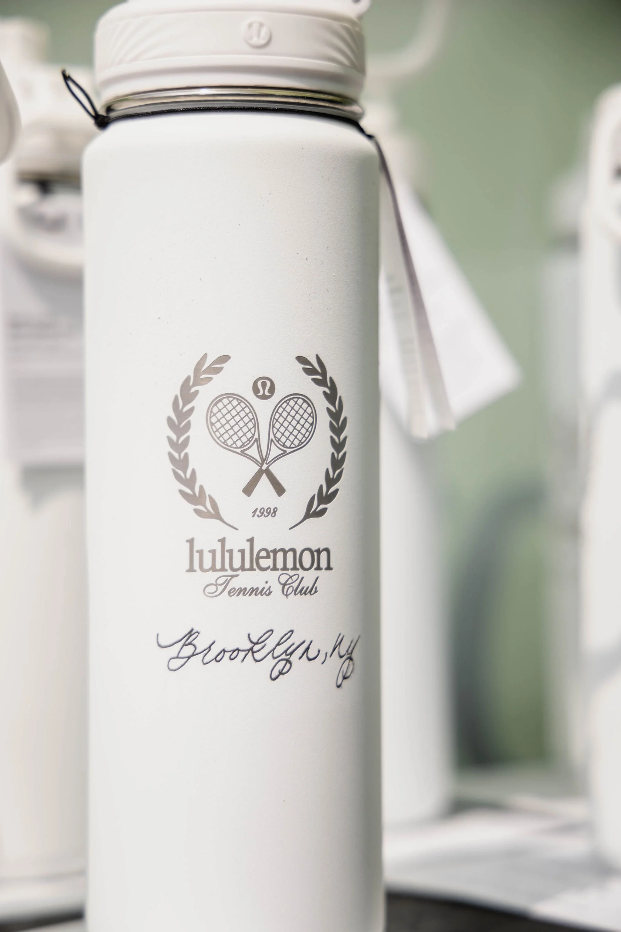 Water bottle hand engraved with calligraphy