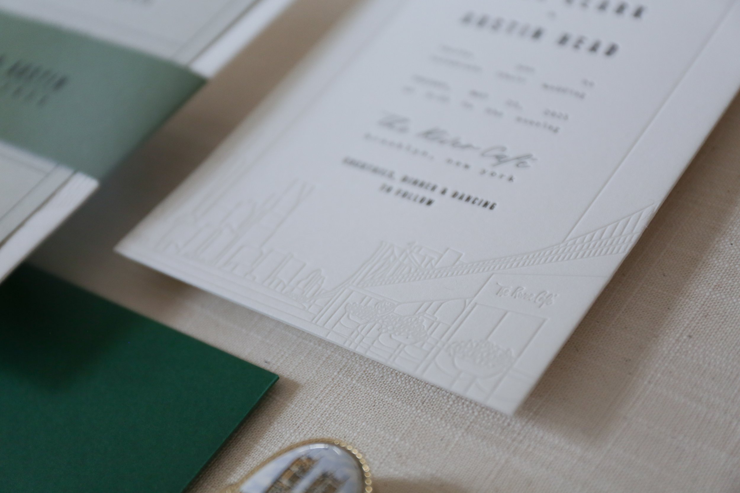 Custom NYC skyline illustration letterpress wedding invitation at The River Cafe
