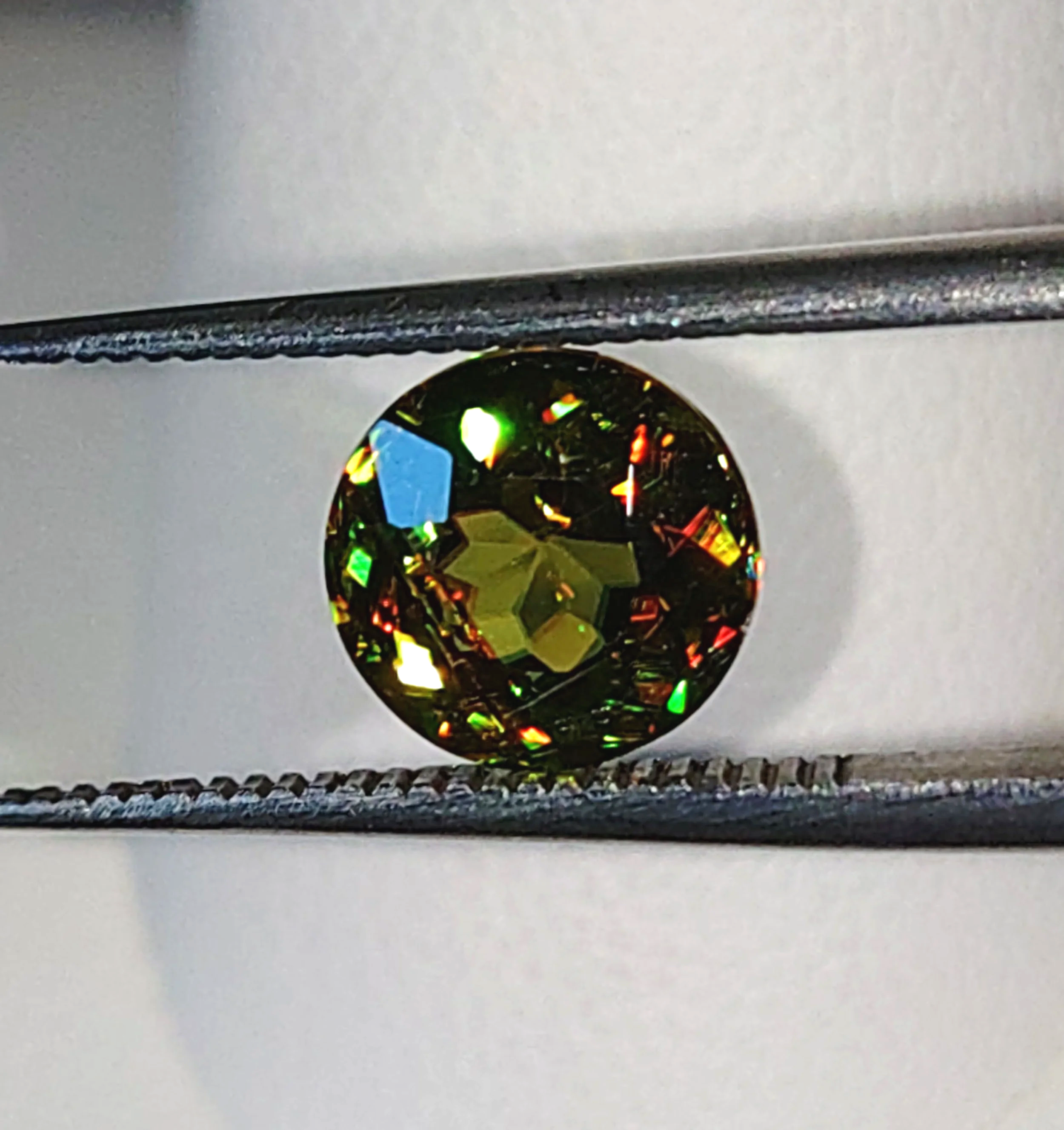 Genuine Color Change Sphene 2ct from TheCoveAtFoxHollow.com