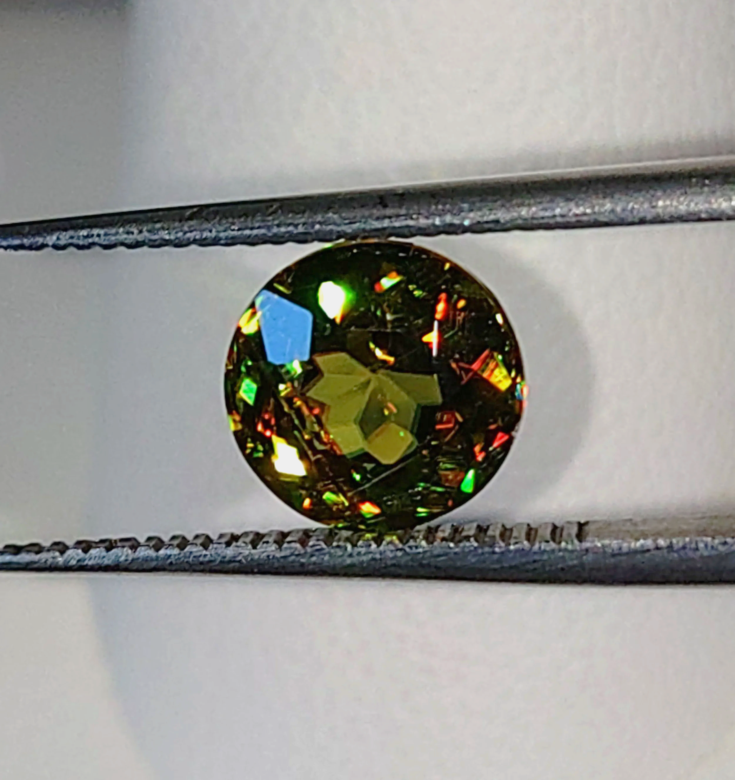 Genuine Color Change Sphene 2ct from TheCoveAtFoxHollow.com