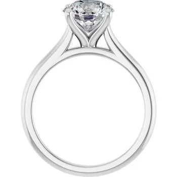 Close-up of a diamond engagement ring with a large central gemstone set in a silver band
