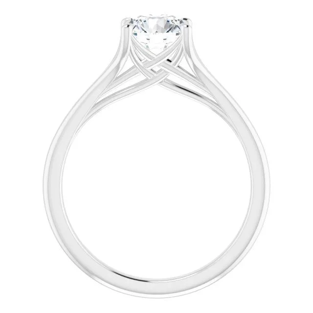 Close-up of a diamond engagement ring with an intricate band design.