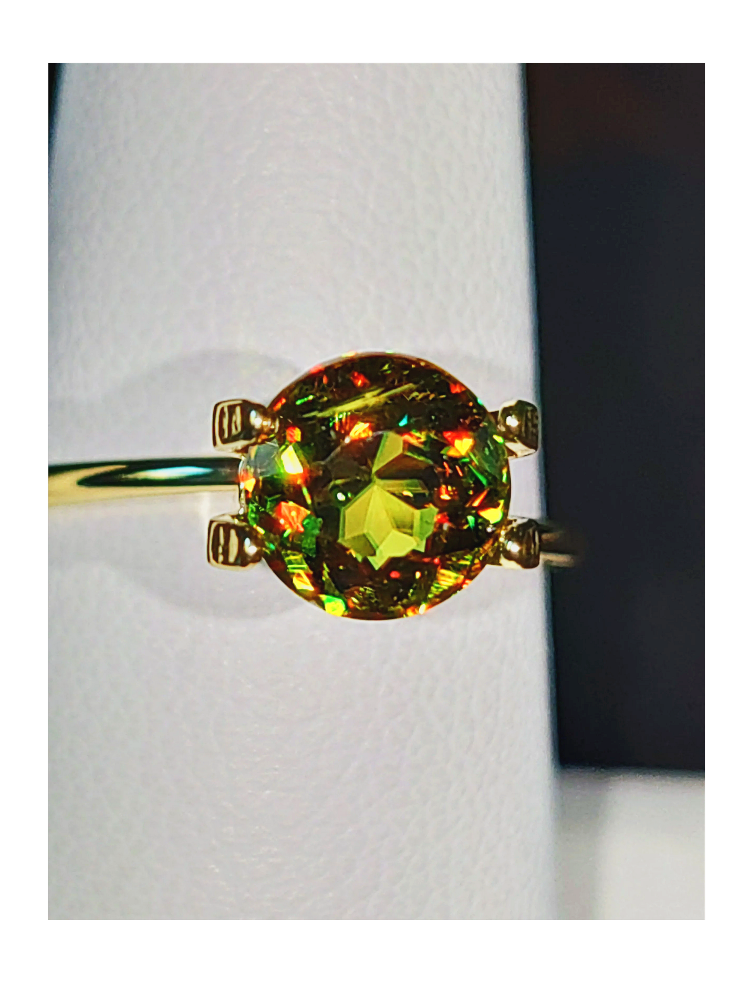 Genuine Color Change Sphene 2ct from TheCoveAtFoxHollow.com