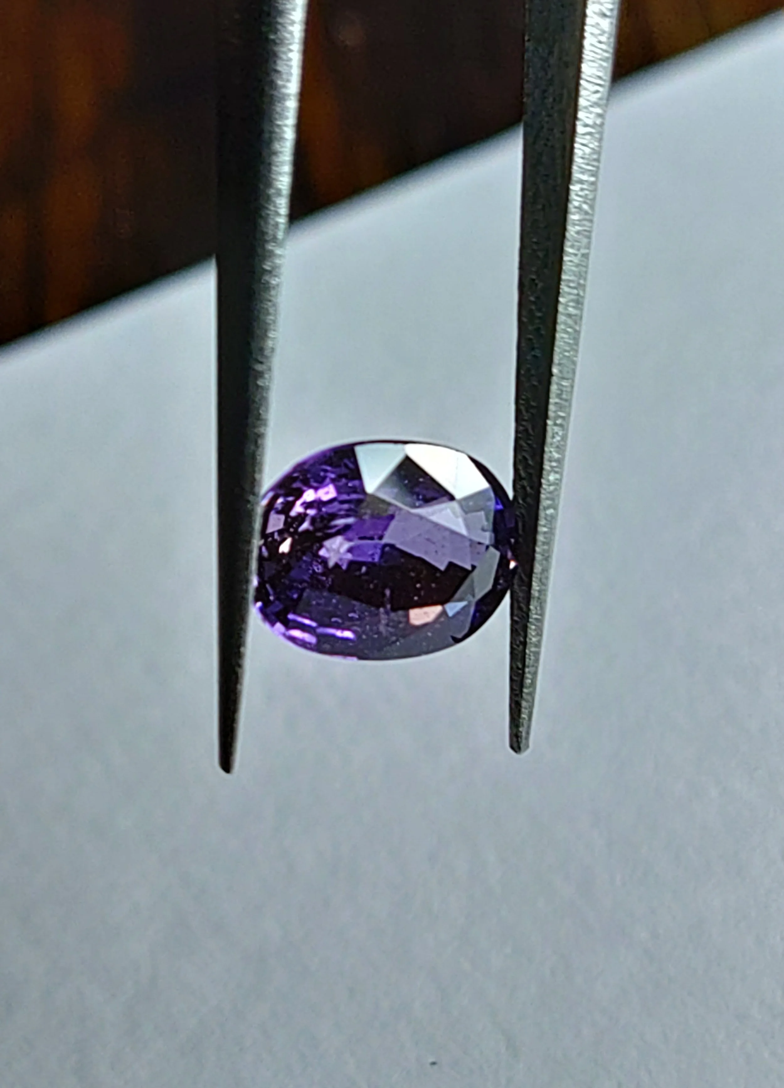 Genuine Ceylon Color Change Sapphire at 1.50ct from TheCoveAtFoxHollow.com