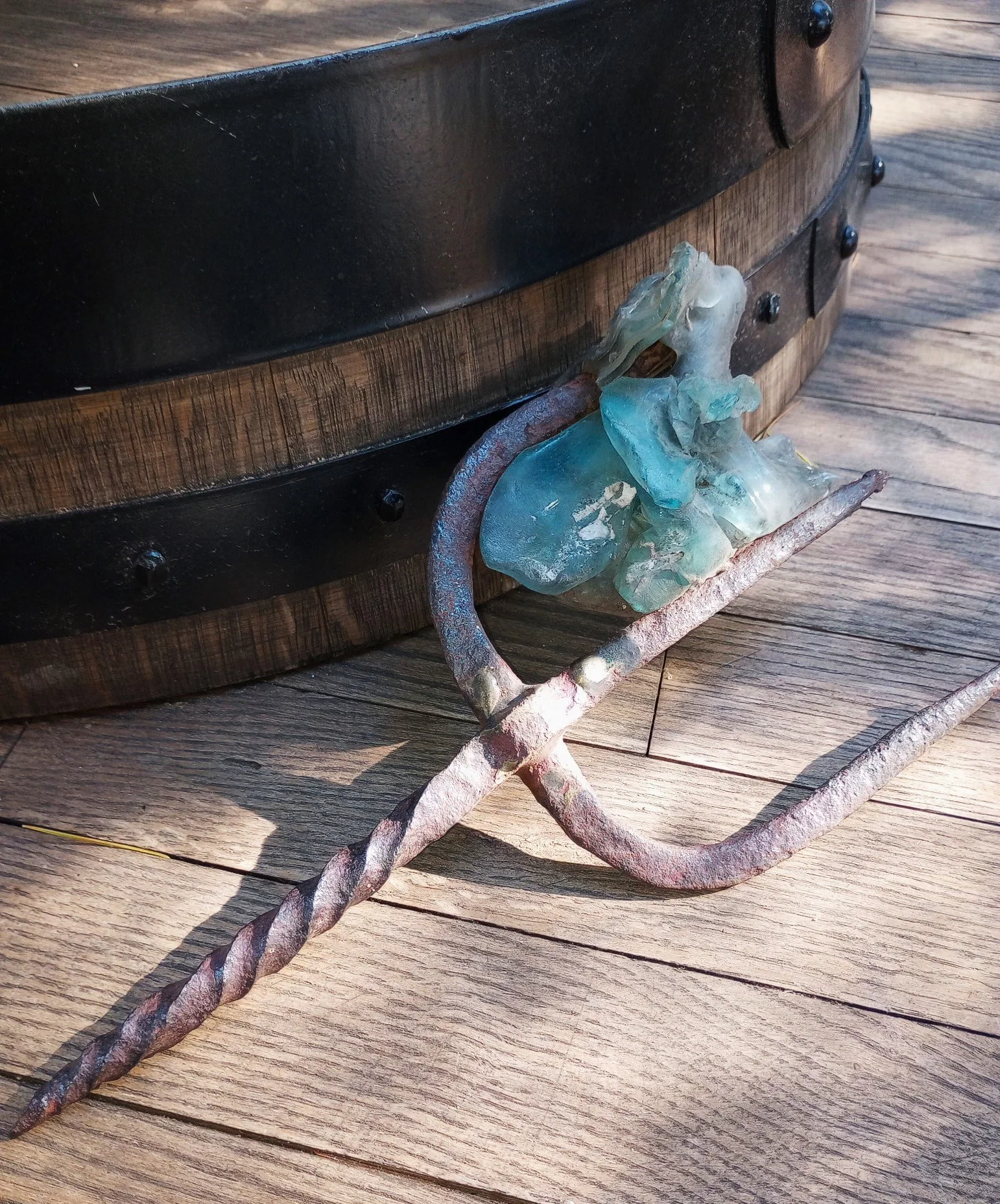 This is our Japanese Glass Float collection that melted during the fire and was stuck in our antique iron trident.