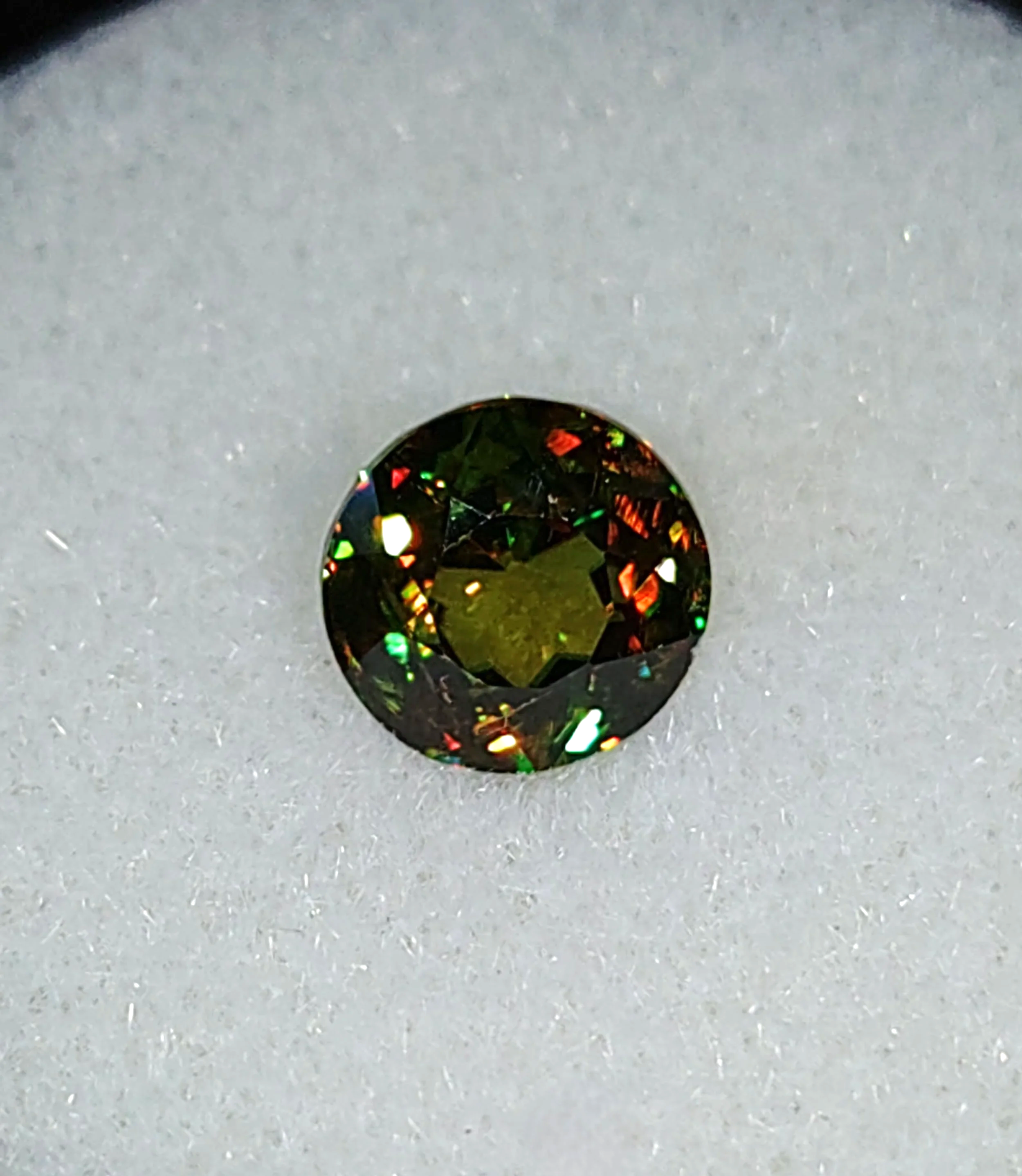 Genuine Color Change Sphene 2ct from TheCoveAtFoxHollow.com