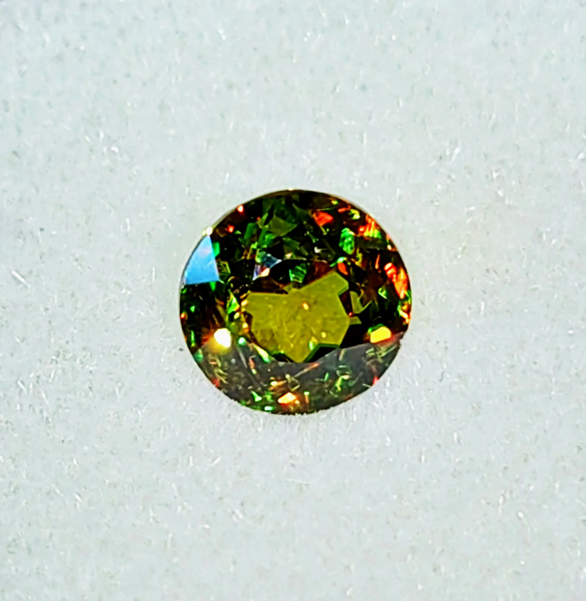 Genuine Color Change Sphene 2ct from TheCoveAtFoxHollow.com