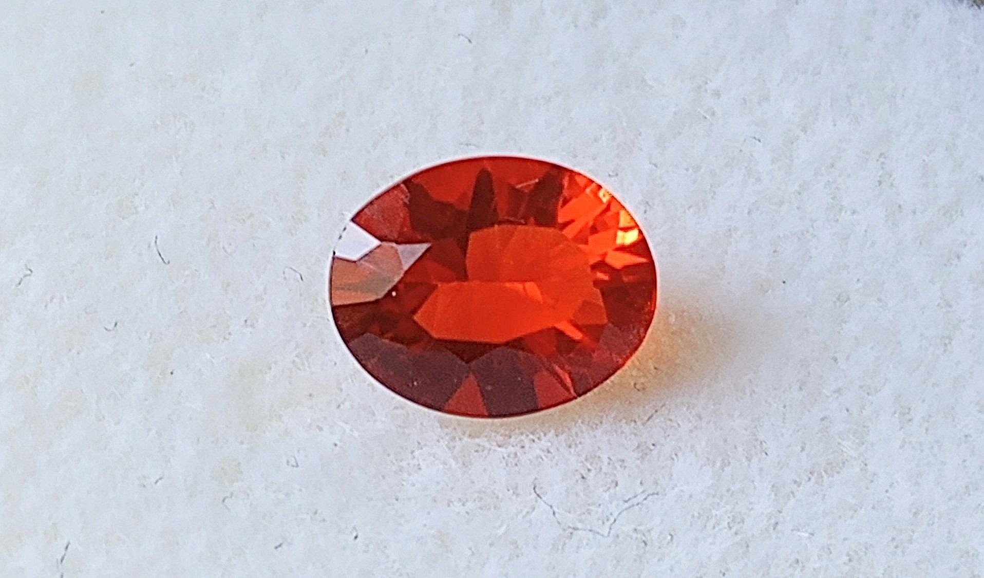 Genuine Fire Opal .82ct from thecoveatfoxhollow.com