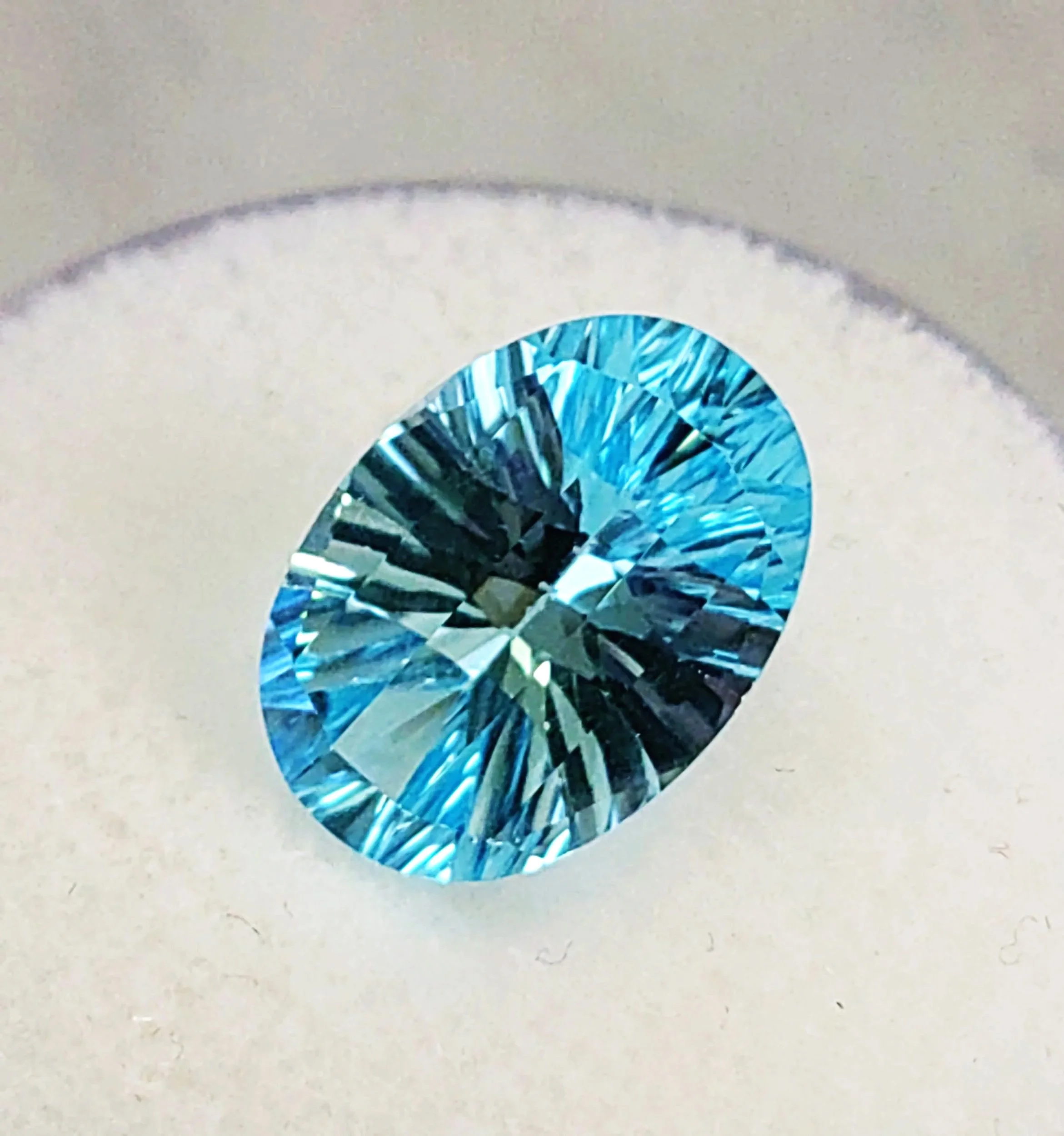 Genuine Swiss Blue Topaz 6.71ct from TheCoveAtFoxHollow.com