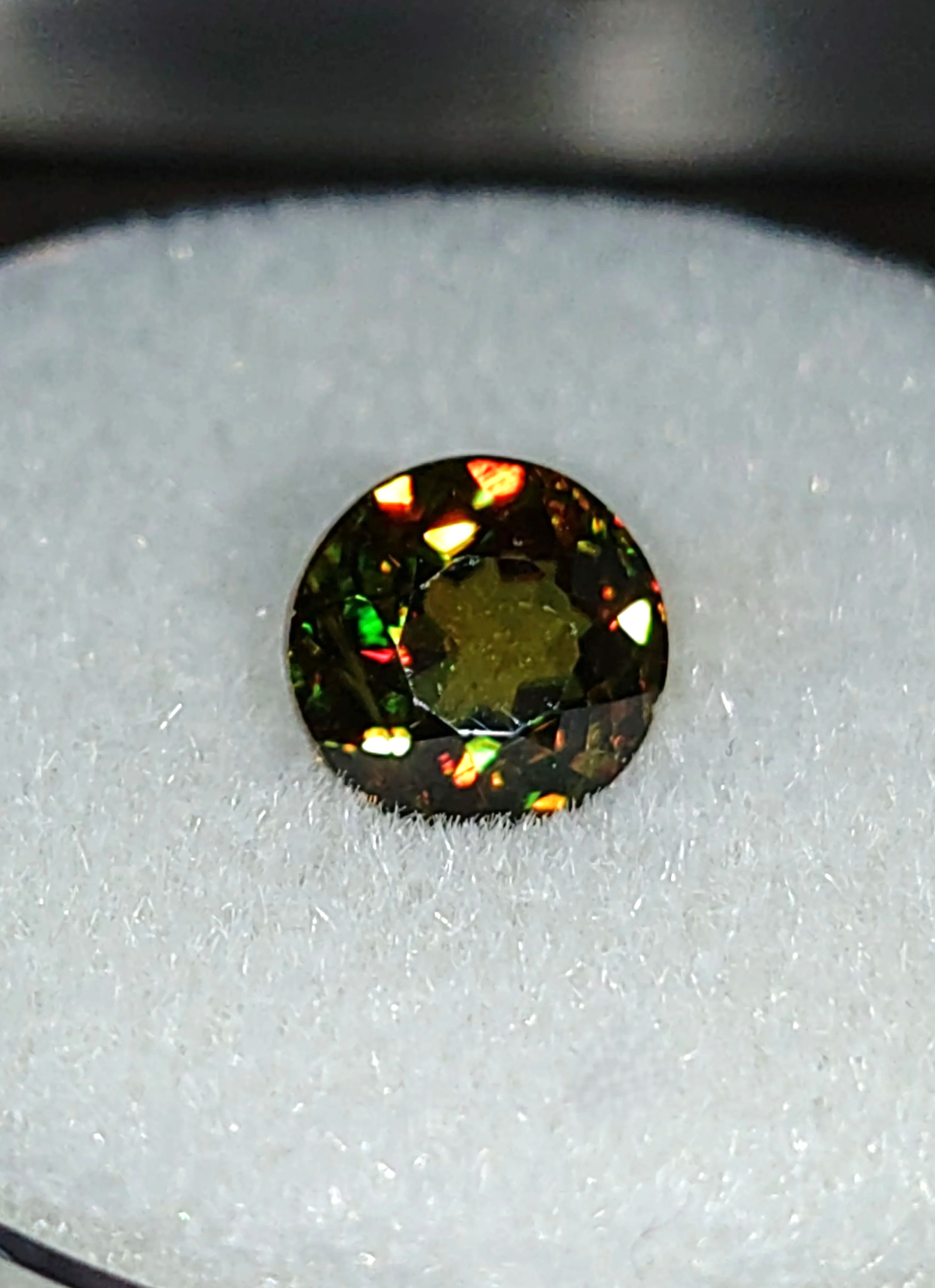 Genuine Color Change Sphene 2ct from TheCoveAtFoxHollow.com