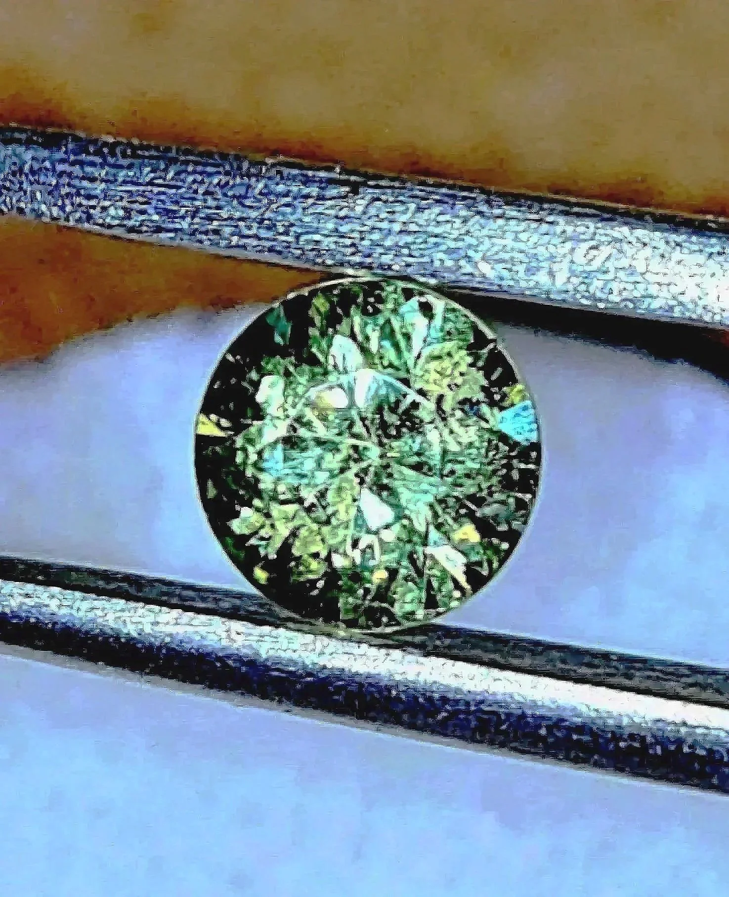 Green Dragon Mine Demantoid Garnet 0.54 carats • Round