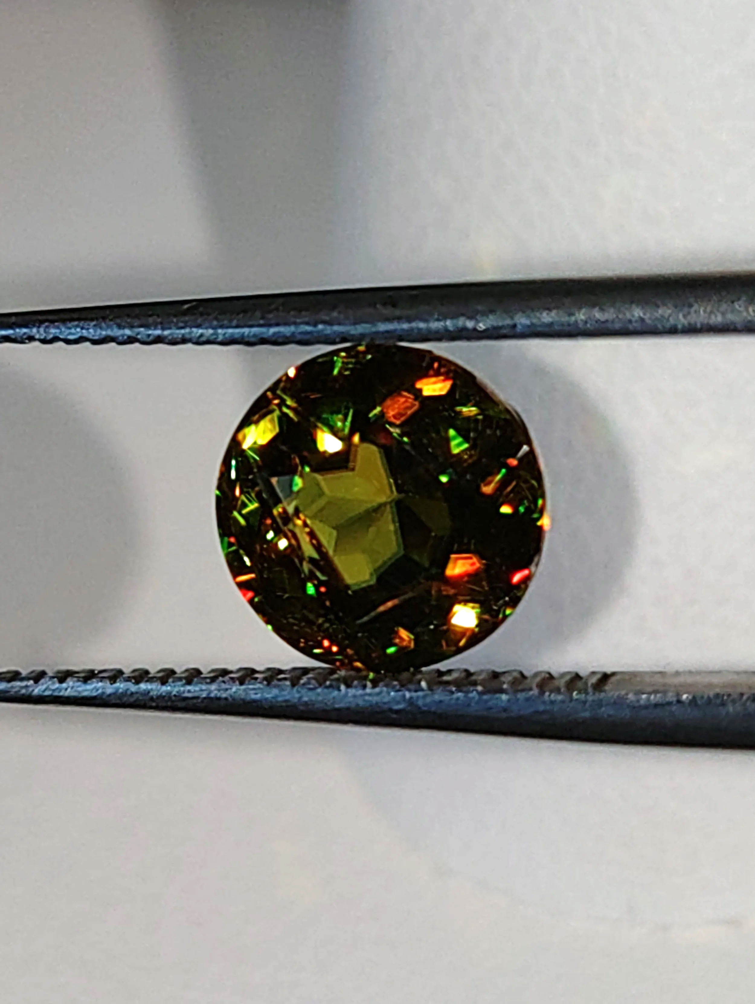 Genuine Color Change Sphene 2ct from TheCoveAtFoxHollow.com