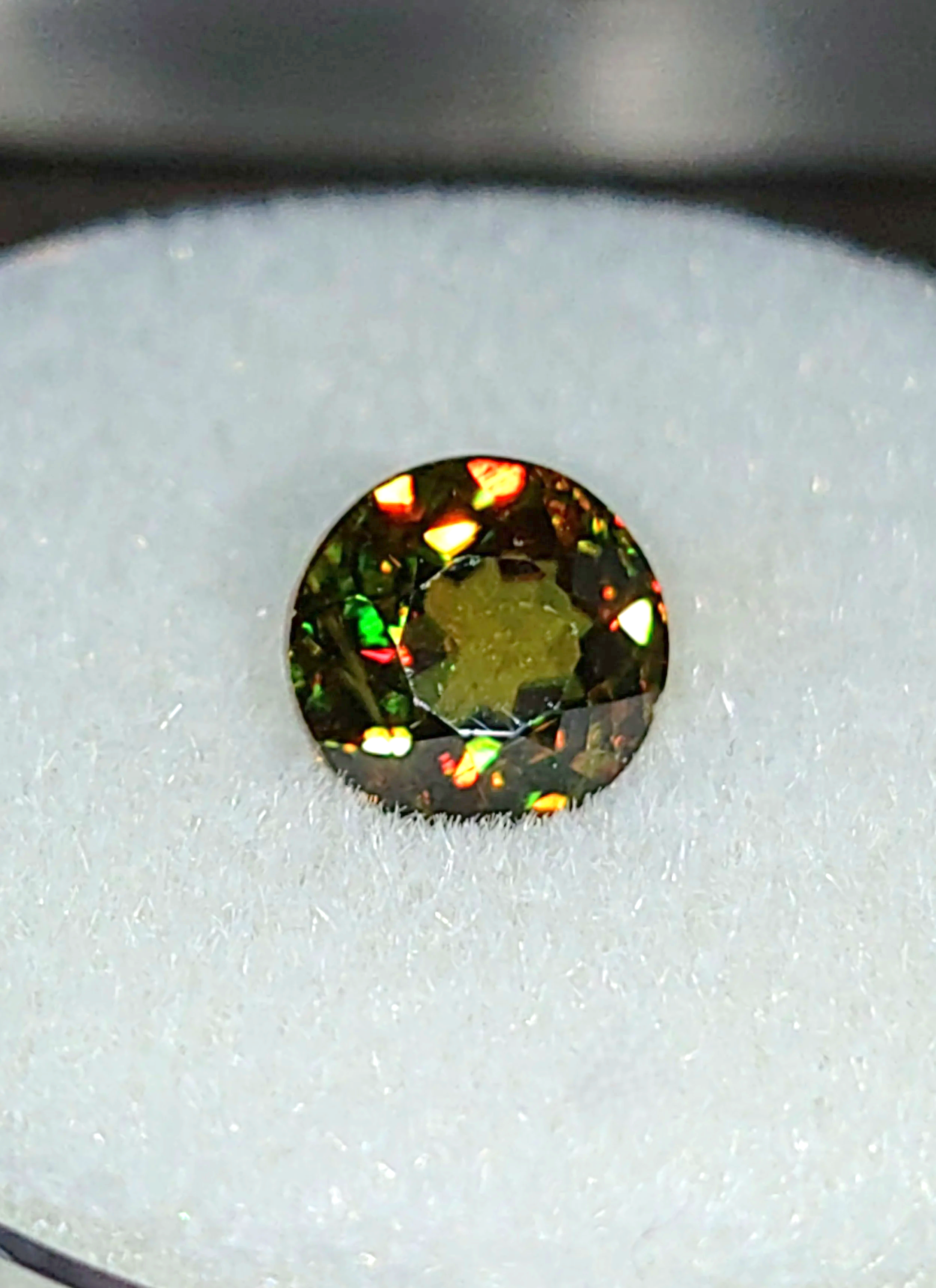 Genuine Color Change Sphene 2ct from TheCoveAtFoxHollow.com