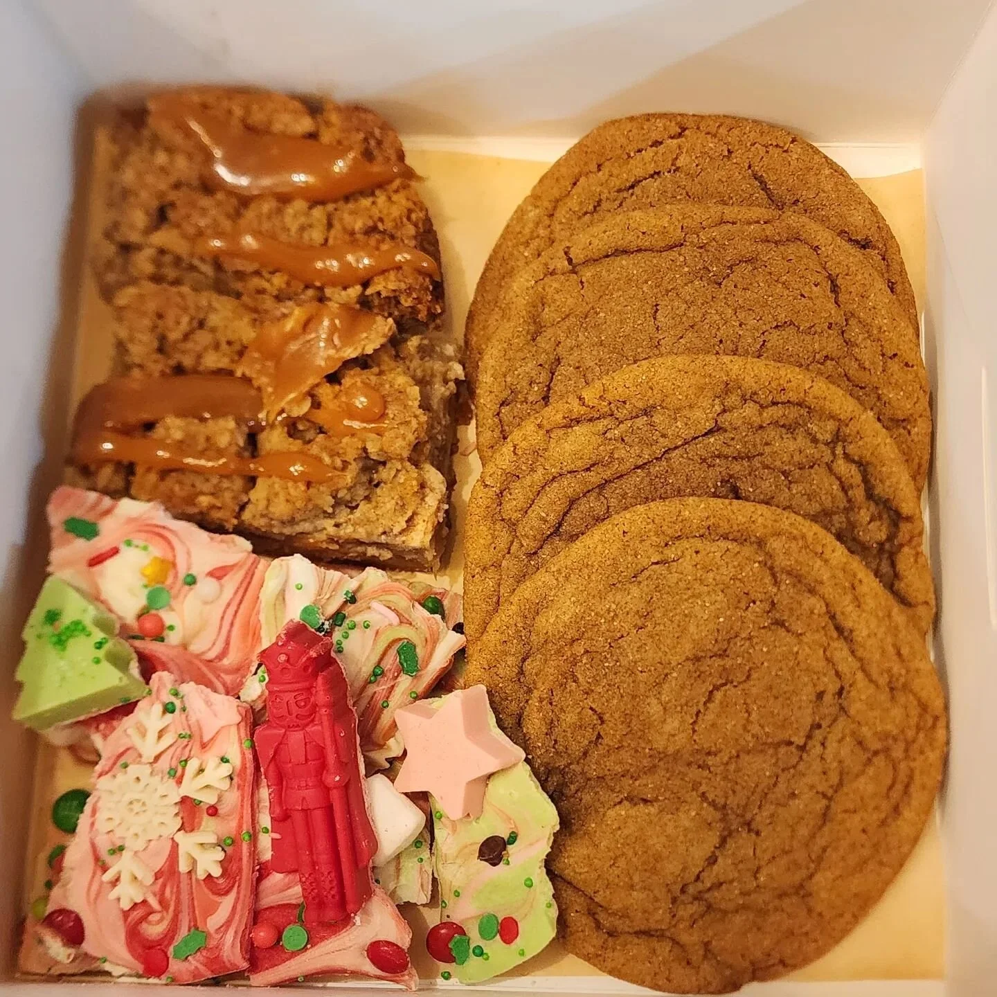 *EDIT: SOLD OUT! Thank you all!*

Did you forget to bake or buy sweets for your holiday gathering, or need a tasty treat to share while relaxing around the tree today? You're in luck! We have a limited number of treat boxes for sale. Each box contain