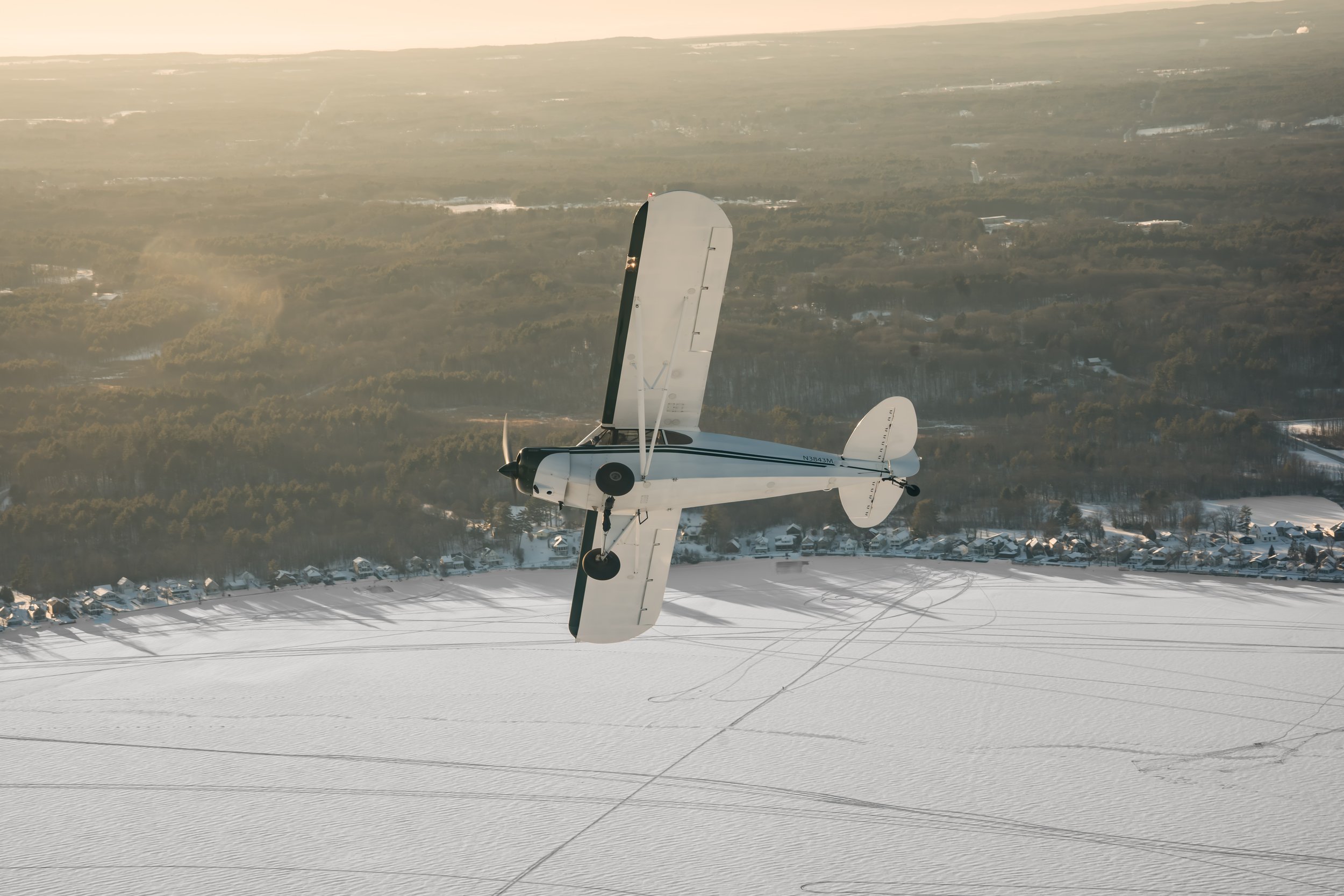 Aerial view of of  aplane flying in the sky with beautiful clouds