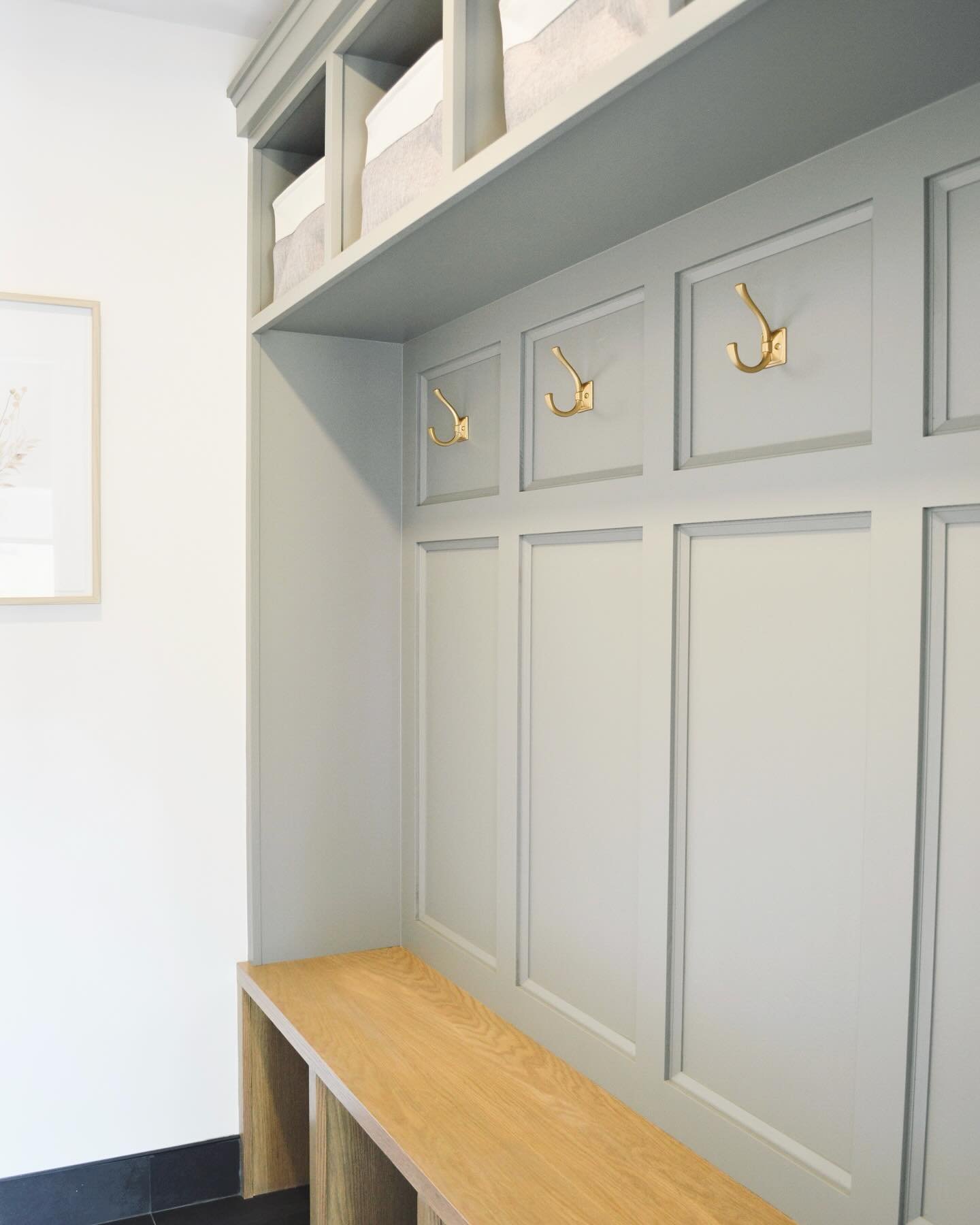 🧥Moody mudroom makeover👞
 
Mudrooms are a landing zone for coats, shoes, and many other items that can quickly create a cluttered entry-way.  By installing a functional built-in that provides designated areas for ALL the things, a mudroom can becom