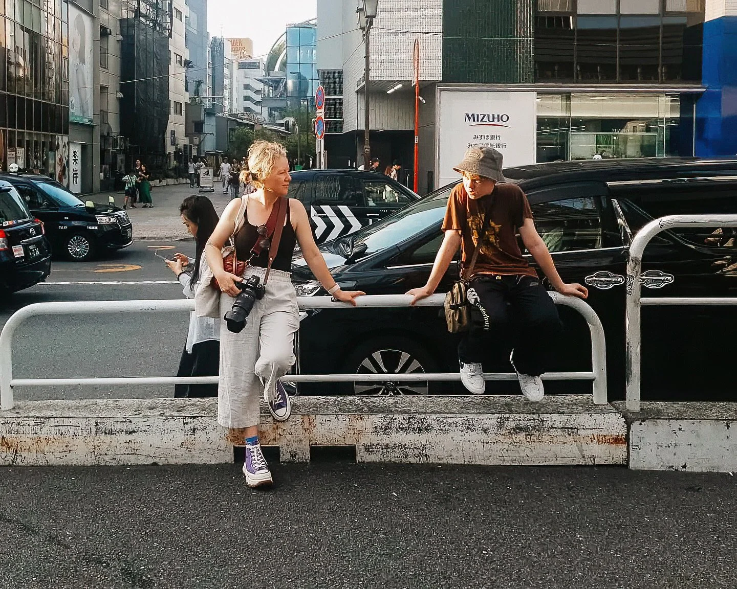 Man I found it hard to get a good shot of my son when in Japan! Every time I&rsquo;d move my camera he&rsquo;d flee the scene! 

My husband caught this one on his phone of the two of us waiting for the train. Late afternoon in SHIBUYA, probably about