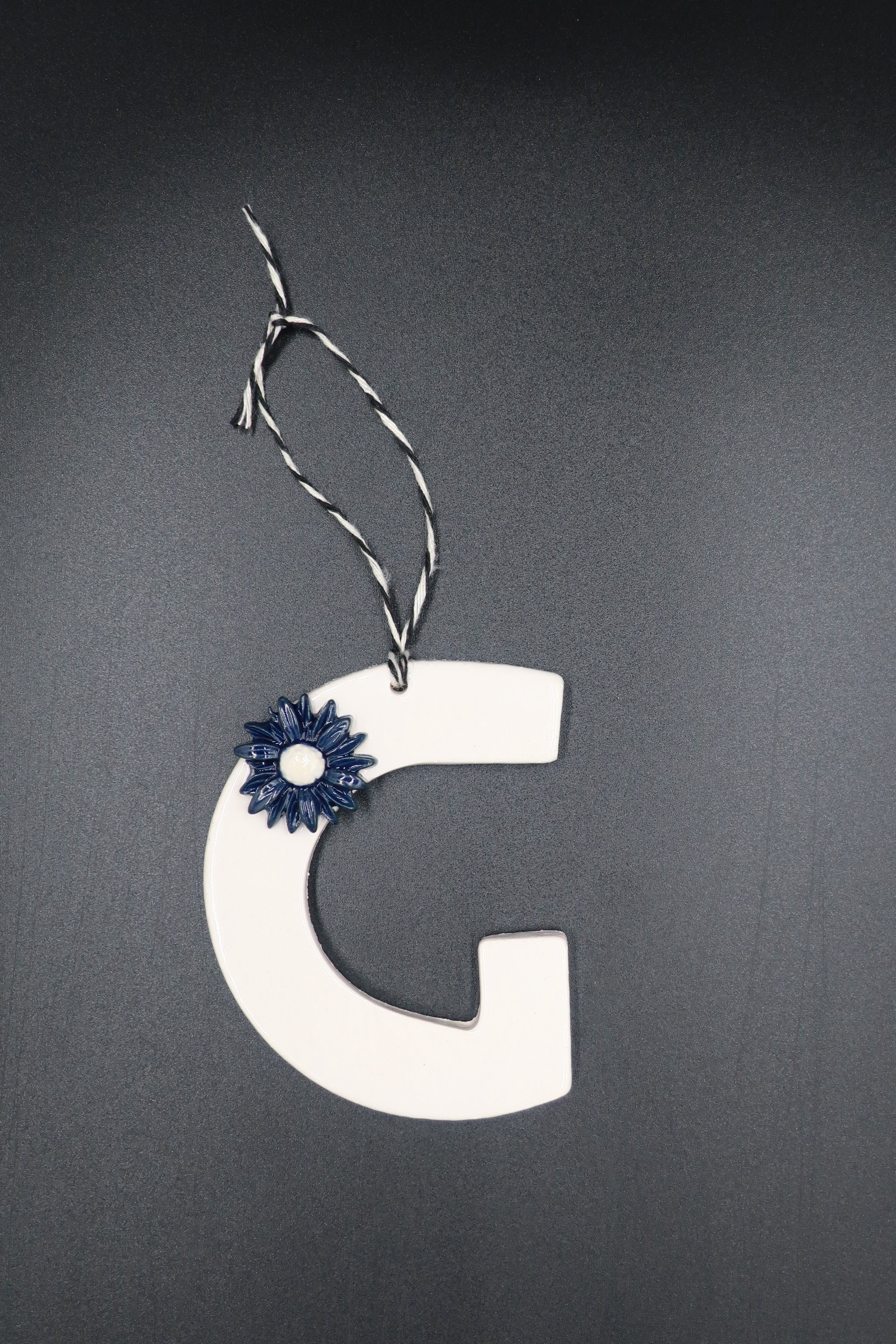 Hanging Letter G