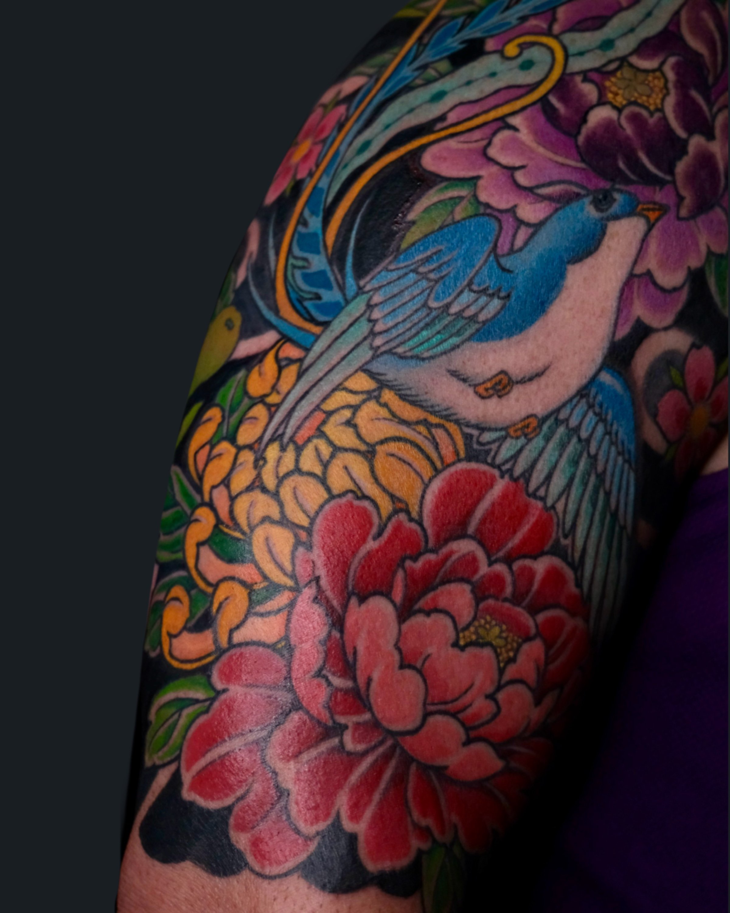 Japanese Half Sleeve tattoo with bird, chrysanthemum, peony, and cherry blossoms by English Cousins at Pilgrimage Tattoo