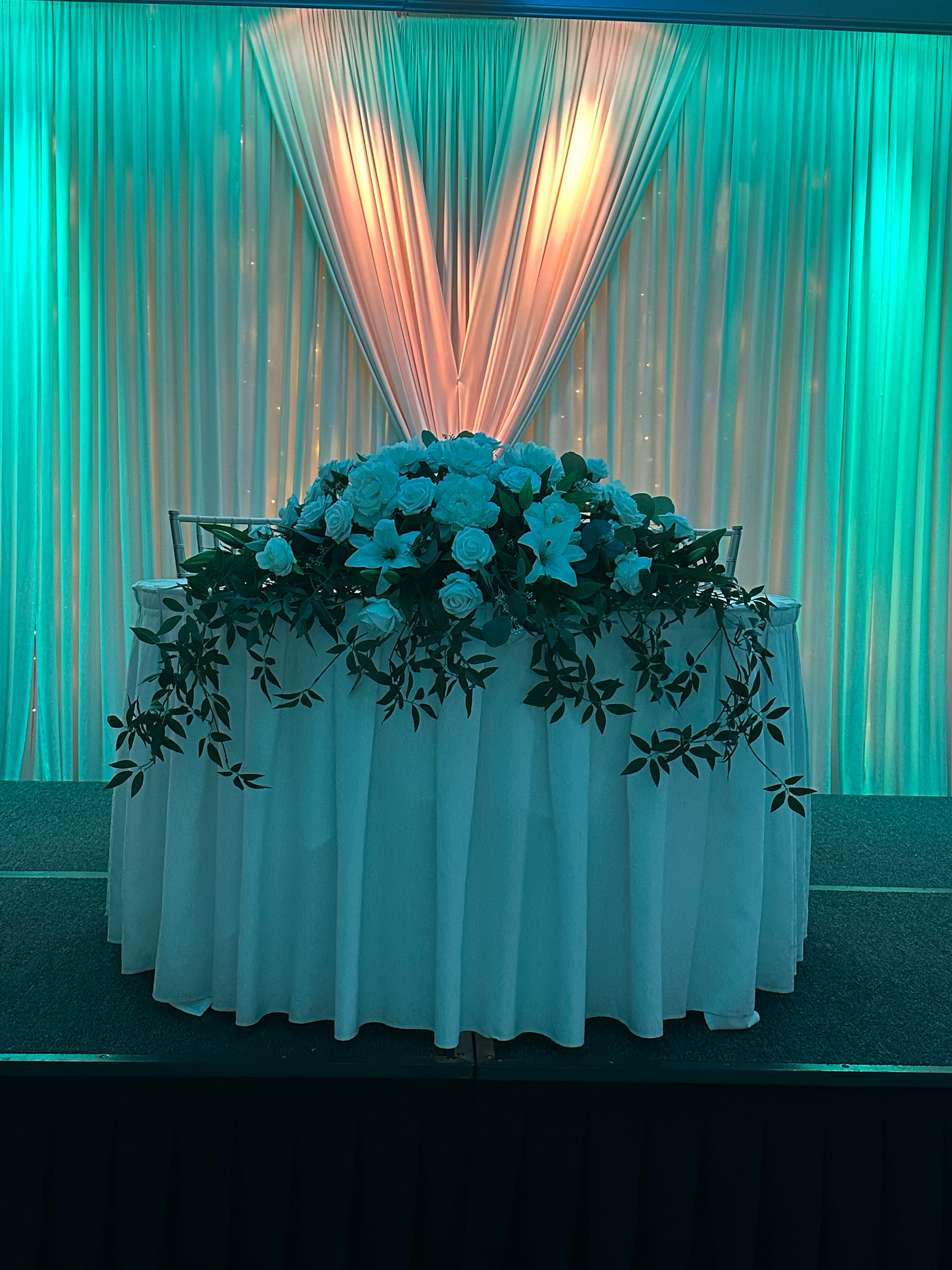 Decorative Flower Arrangement with White Roses and Lilies.