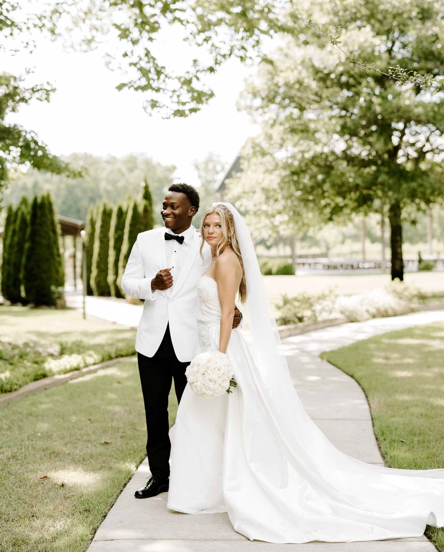 Reminiscing on warm air, sun-soaked moments, and hearts burning with love and devotion.

Couple: @gracegardnerr_ @titusgardnerr
Venue: @southern.grace.weddings
Dress: @bluehousebridal (The train of her dress was originally her mother&rsquo;s dress 🥹